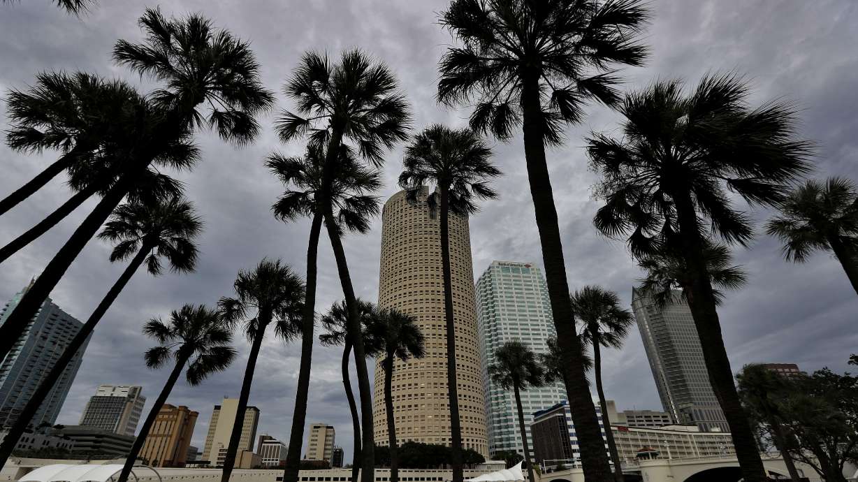 The Latest: Irma inland near Tampa, still Category 2 storm