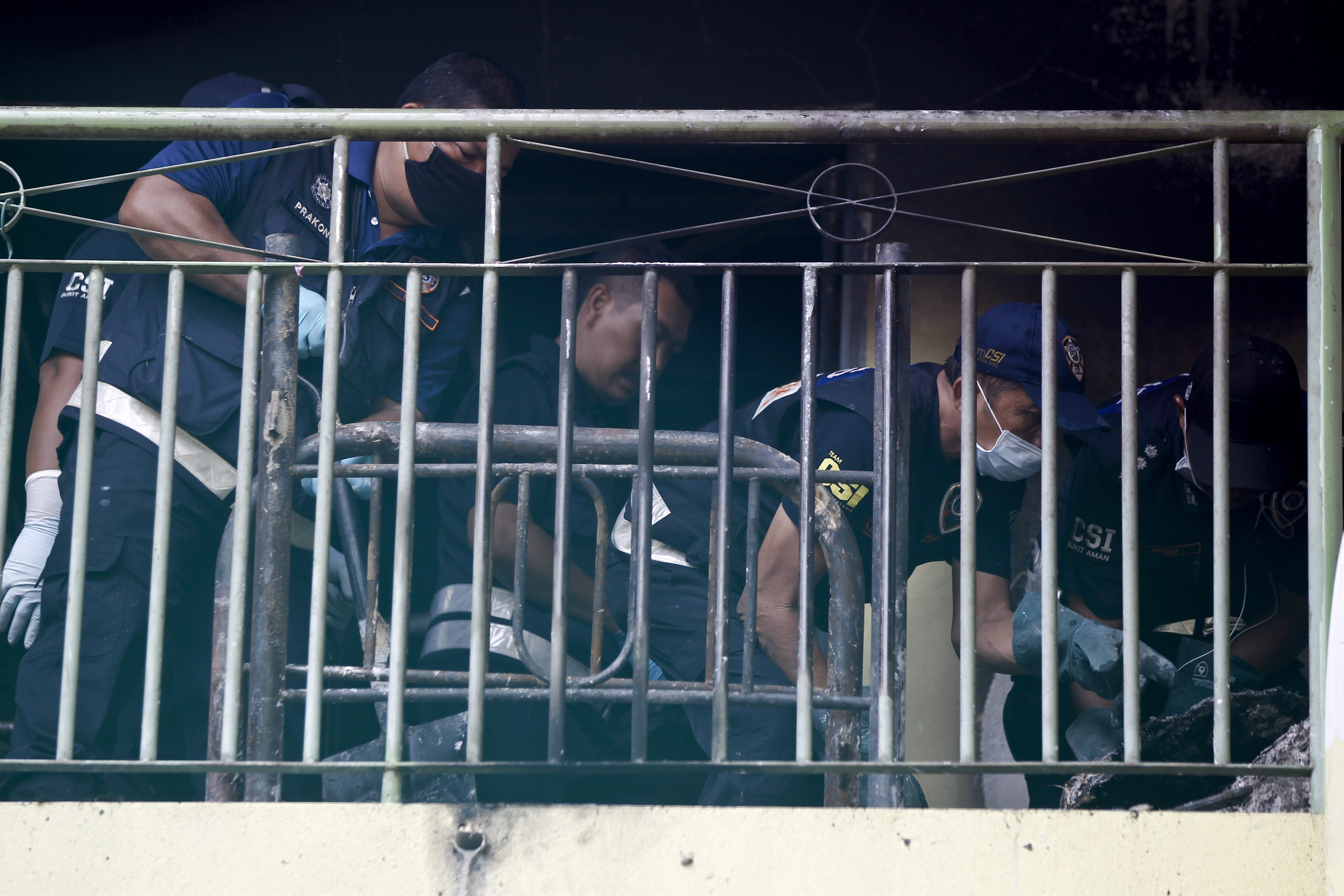 21 boys who died in school fire buried in Malaysia