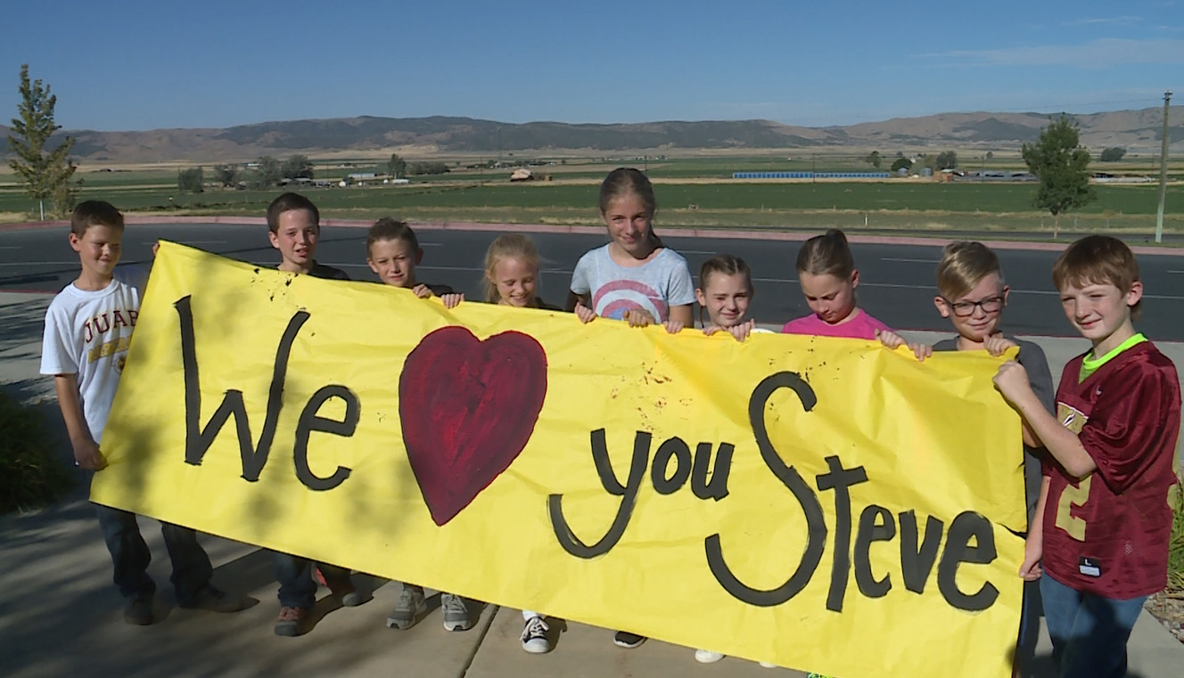 Students of Red Cliffs Elementary School in Nephi get ready to welcome home Steve Peterson, their school bus driver, who was seriously injured while driving kids home from school after an oncoming camp trailer swung into the bus. In Nephi, Wednesday, Sept. 13. 2017. (Photo: Steve Landeen, KSL)