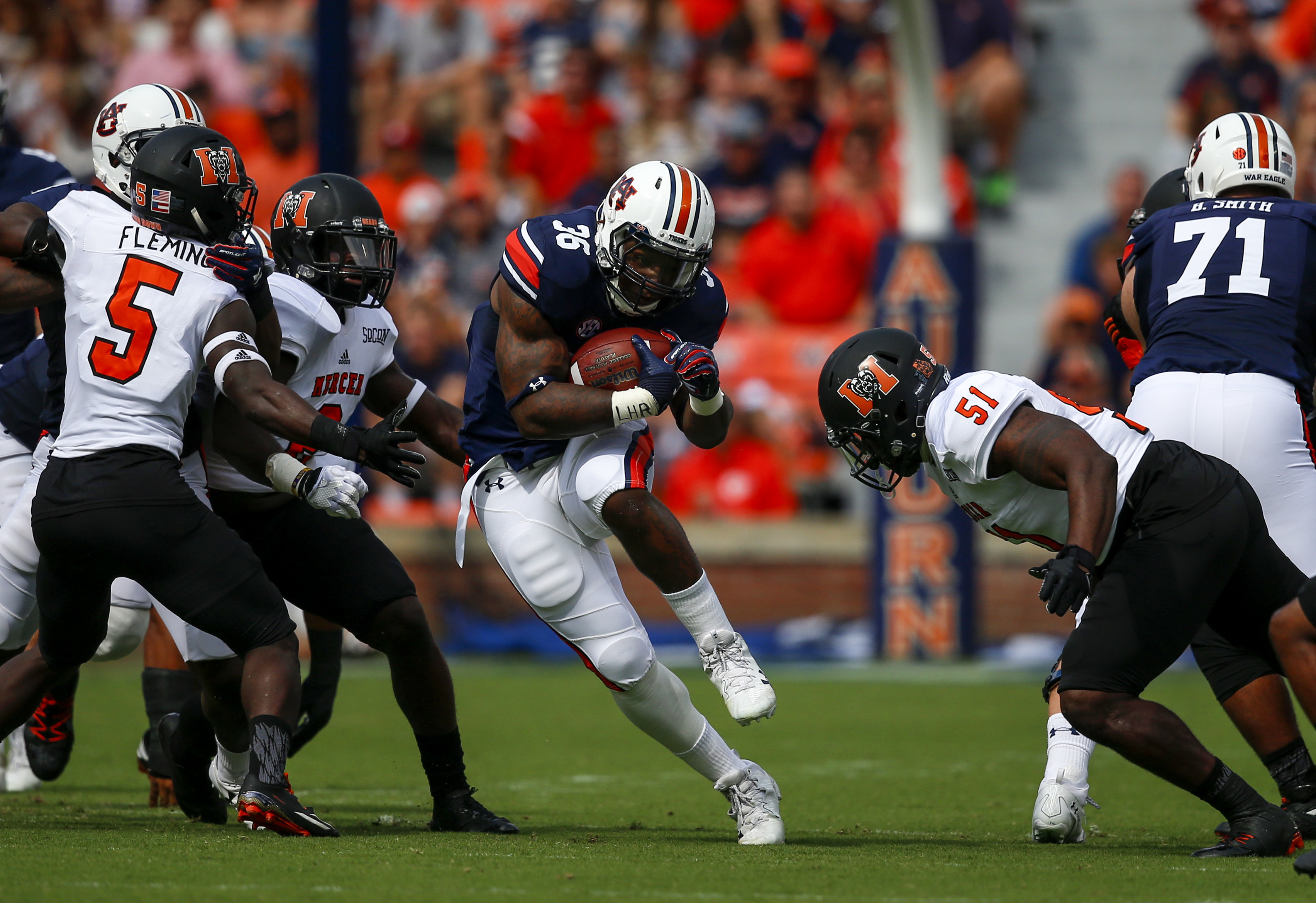 Auburn lineman Darius James carted off field with injury
