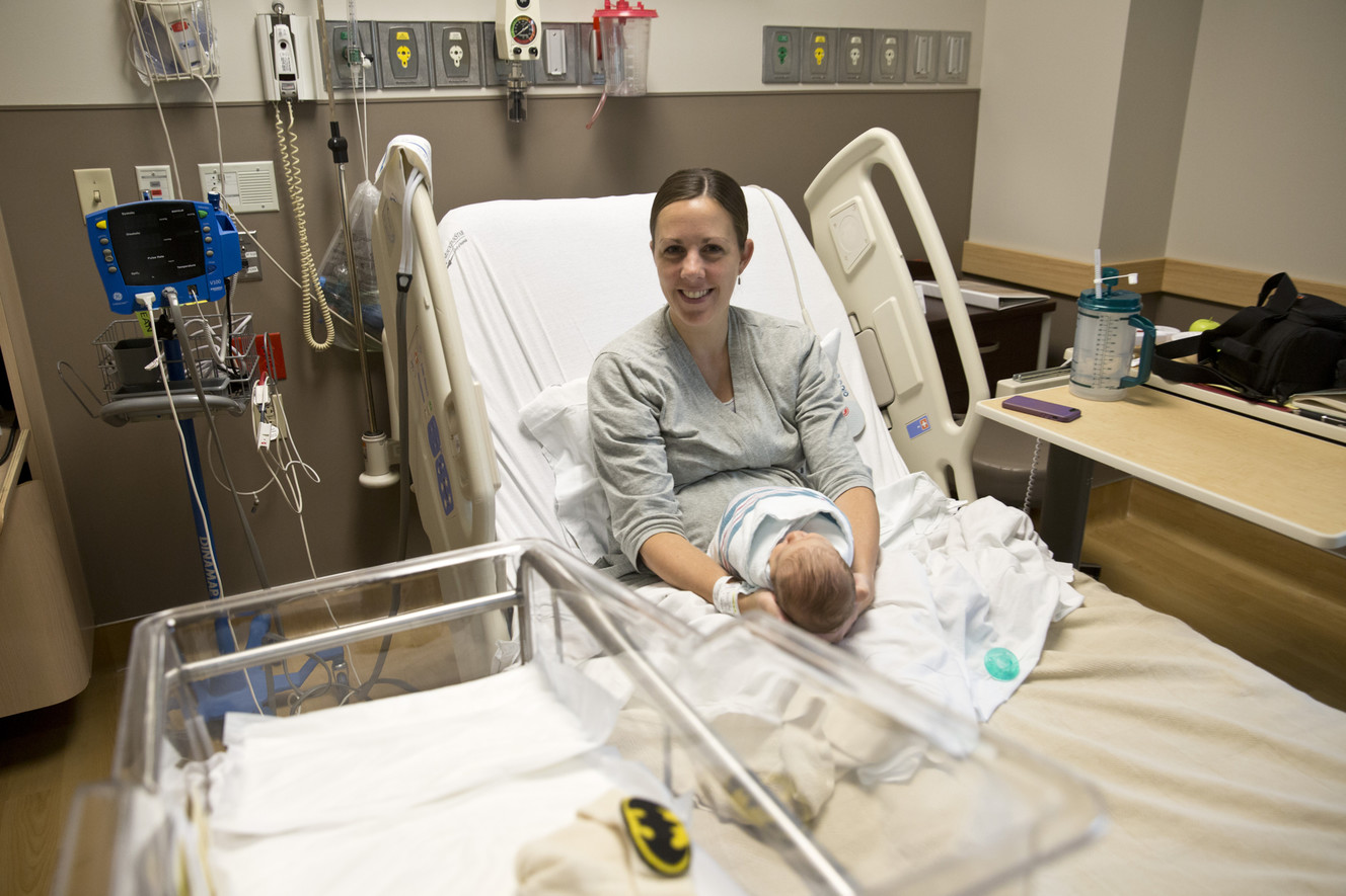 Katie King holds her newborn son Jonathan on Wednesday, Sept. 6, 2016, at Timpanogos Regional Hospital. Hospitals are now offering extra amenities for comfort during and after labor. This is really a trend that's only picked up in the last two years. (Photo: Sammy Jo Hester, The Daily Herald via AP)