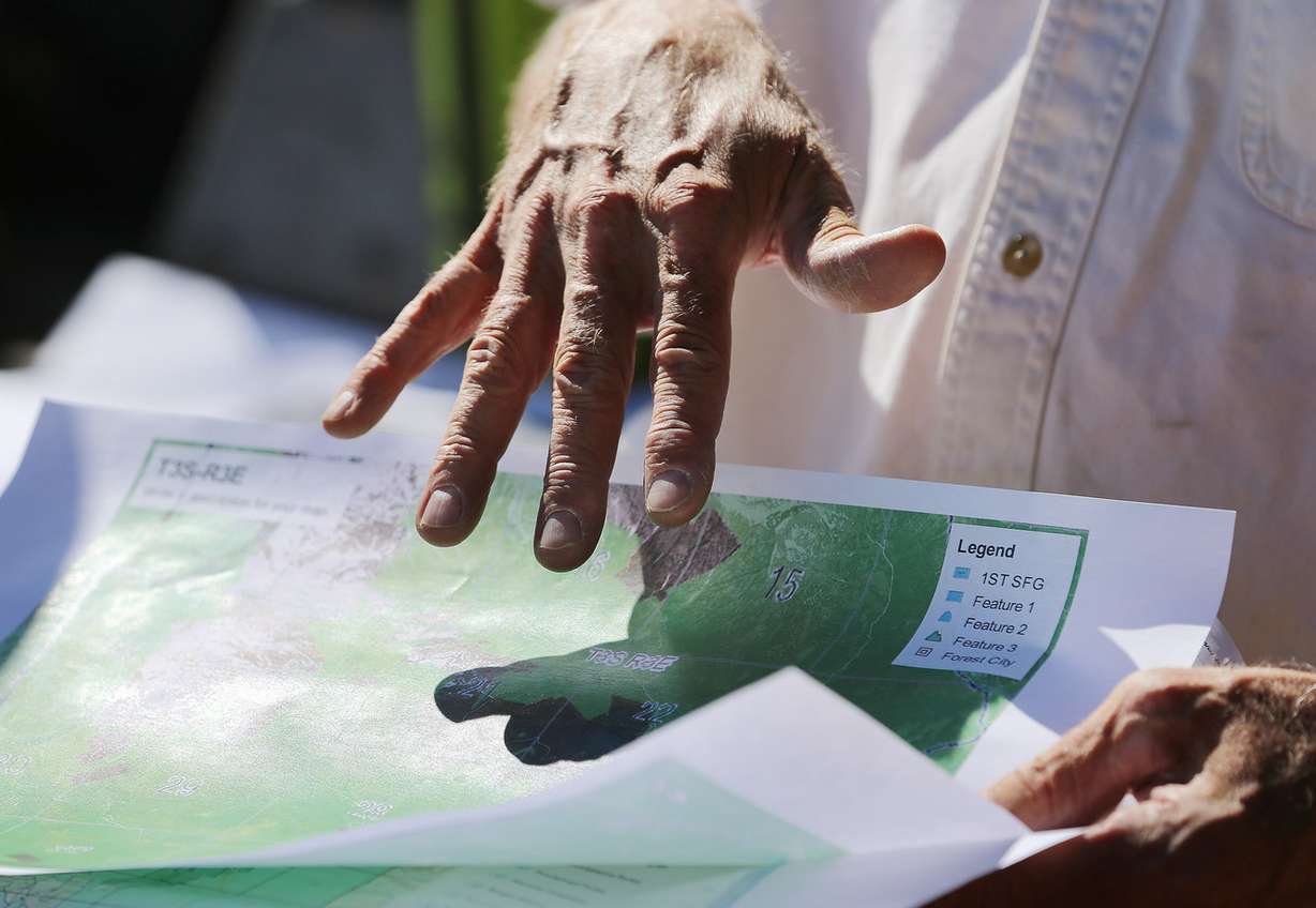 Dan Webb, chief surveyor for the Bureau of Land Management, explains issues with current maps during a tour of American Fork Canyon on Monday, Sept. 18, 2017. (Photo: Scott G Winterton, Deseret News)