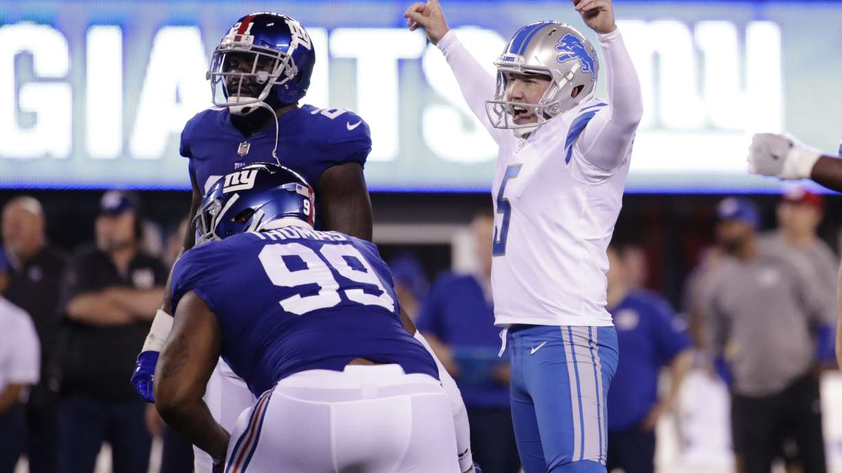 Stafford throws for 2 TDs as Lions beat Beckham, Giants