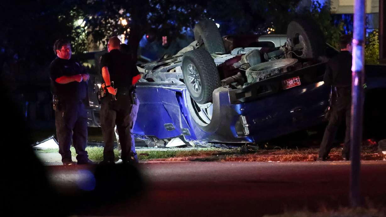 Police investigate the crash that killed Tami Lynn Woodard and Lloyd Everett Pace in Kearns on Sept. 19, 2017. Three men were convicted of murder in their deaths earlier this month.