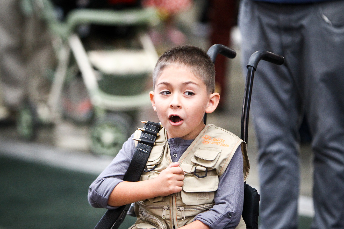 Adrian Paz's wheelchair costume is seen during Salt Lake Comic Con at the Salt Palace on Thursday, Sept. 21, 2017. The "Jurassic Park"-themed costume resembles a rugged jungle cart being pulled by a harnessed raptor. (Photo: Adam Fondren, Deseret News)