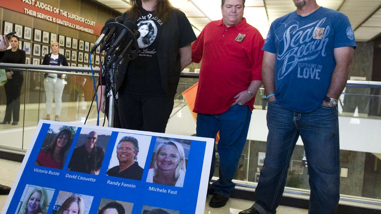 The Latest: Man gets life terms for killing 8 at hair salon