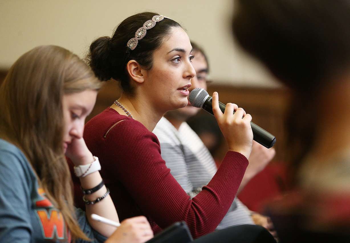 Christina Giardinelli a U of U student majoring in international studies asks a question to the panel as the Lowell Bennion Community Service Center and the Hinckley Institute of Politics at the University of Utah holds a panel discussion on free speech on Monday, Sept. 25, 2017. (Photo: Scott G Winterton, Deseret News)