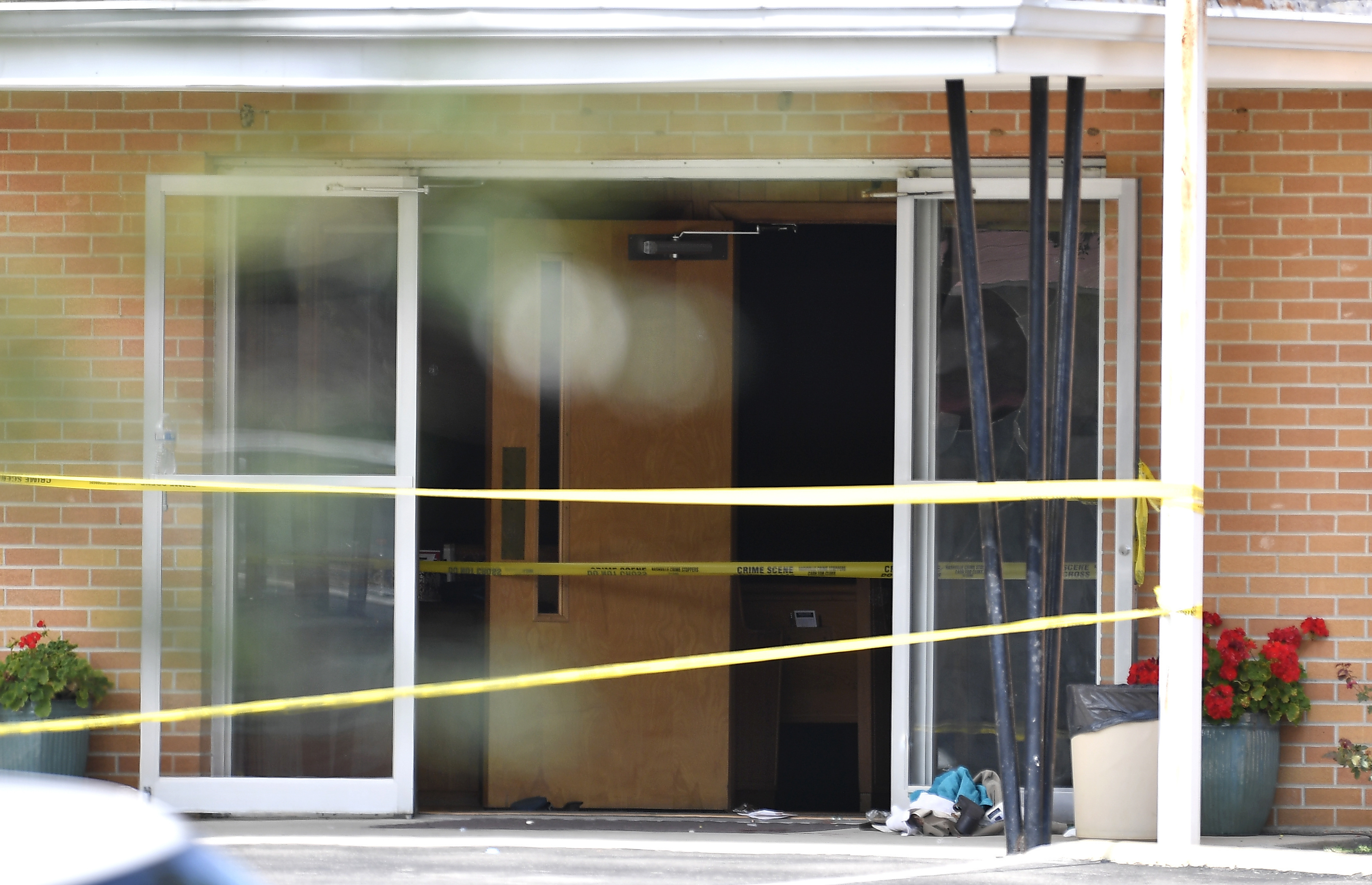 The Latest: Minister shot in church: 'I thought I was dying'