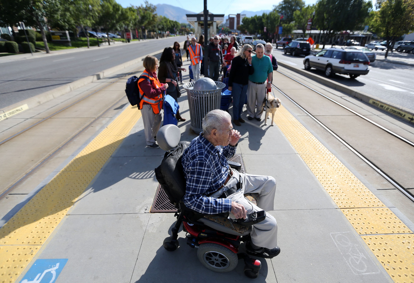 John Doyle waits for a group to gather and walk to the grocery store together as part of Salt Lake County Aging and Adult Services' Transit Together Grocery Project, made possible with funding provided by AARP, in Salt Lake City, on Tuesday, Sept. 26, 2017. (Photo: Kristin Murphy, Deseret News)