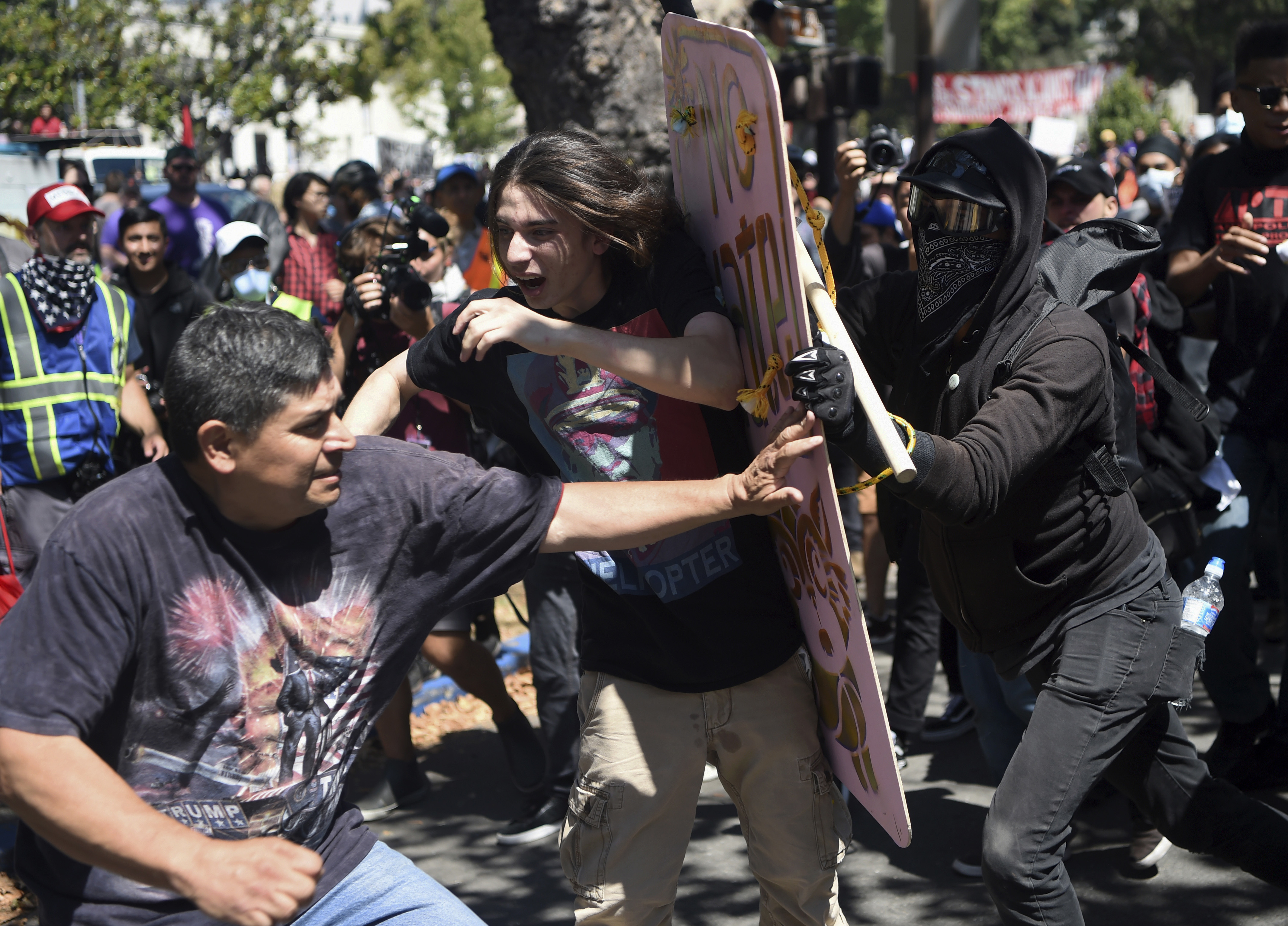 The Latest: 2 arrests at Ben Shapiro protests on Utah campus