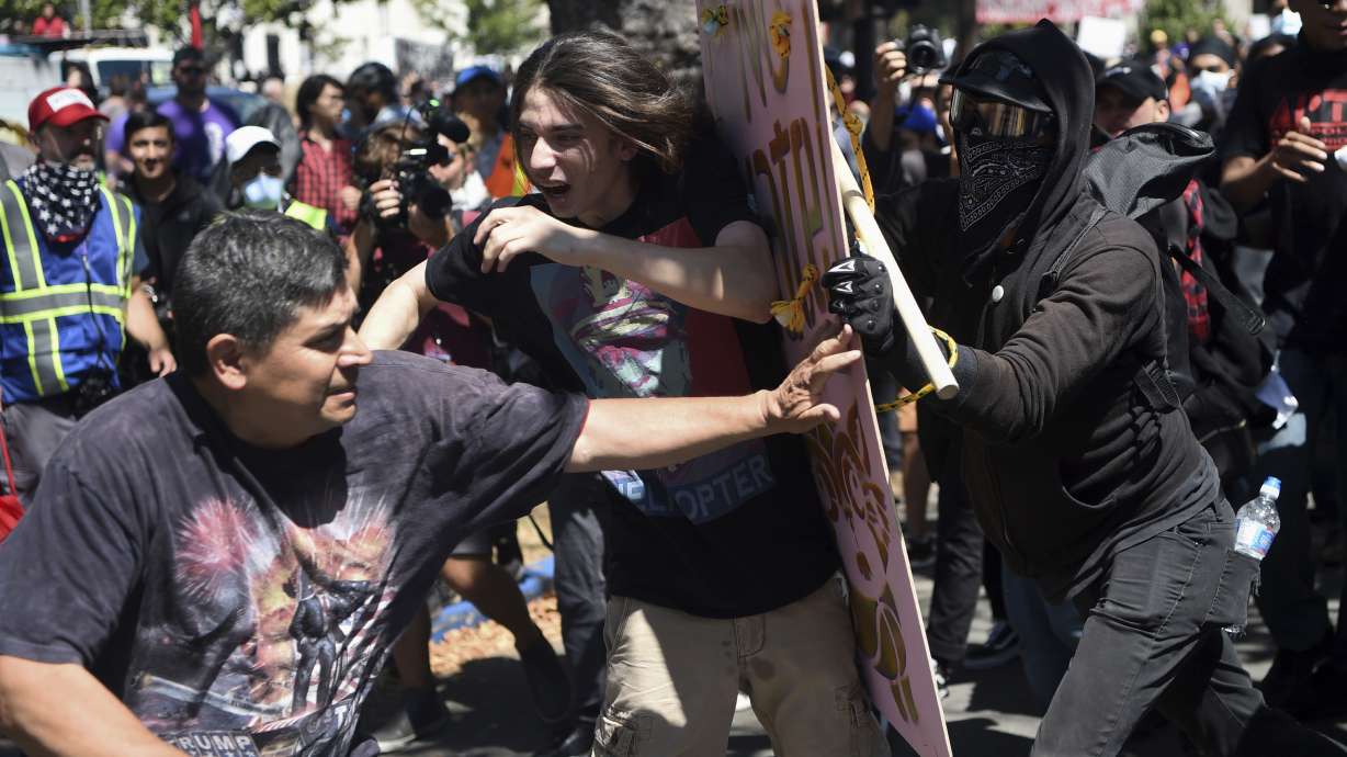 The Latest: 2 arrests at Ben Shapiro protests on Utah campus