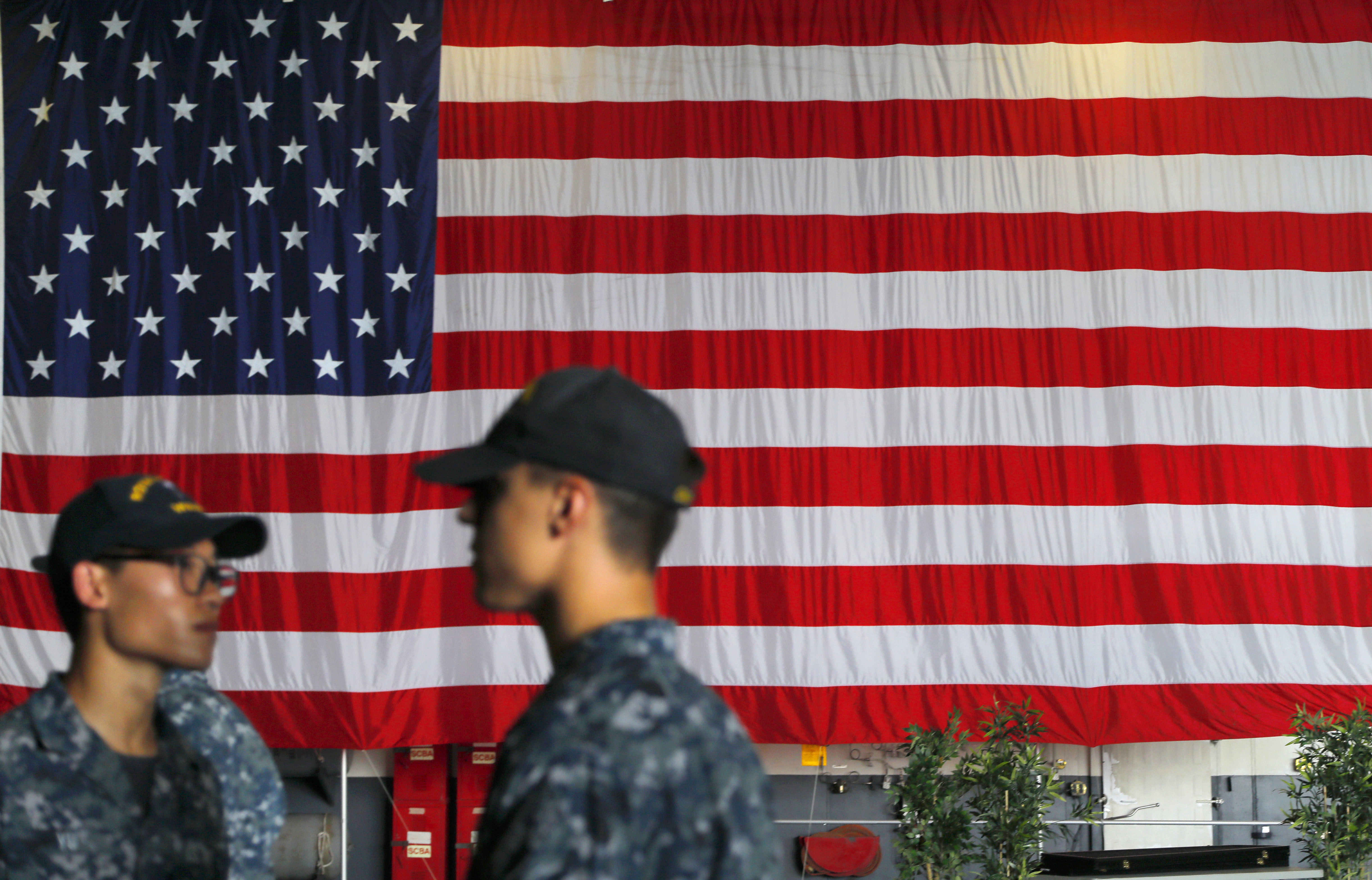 The Latest: US Navy admiral pledges to defend Japan, S.Korea