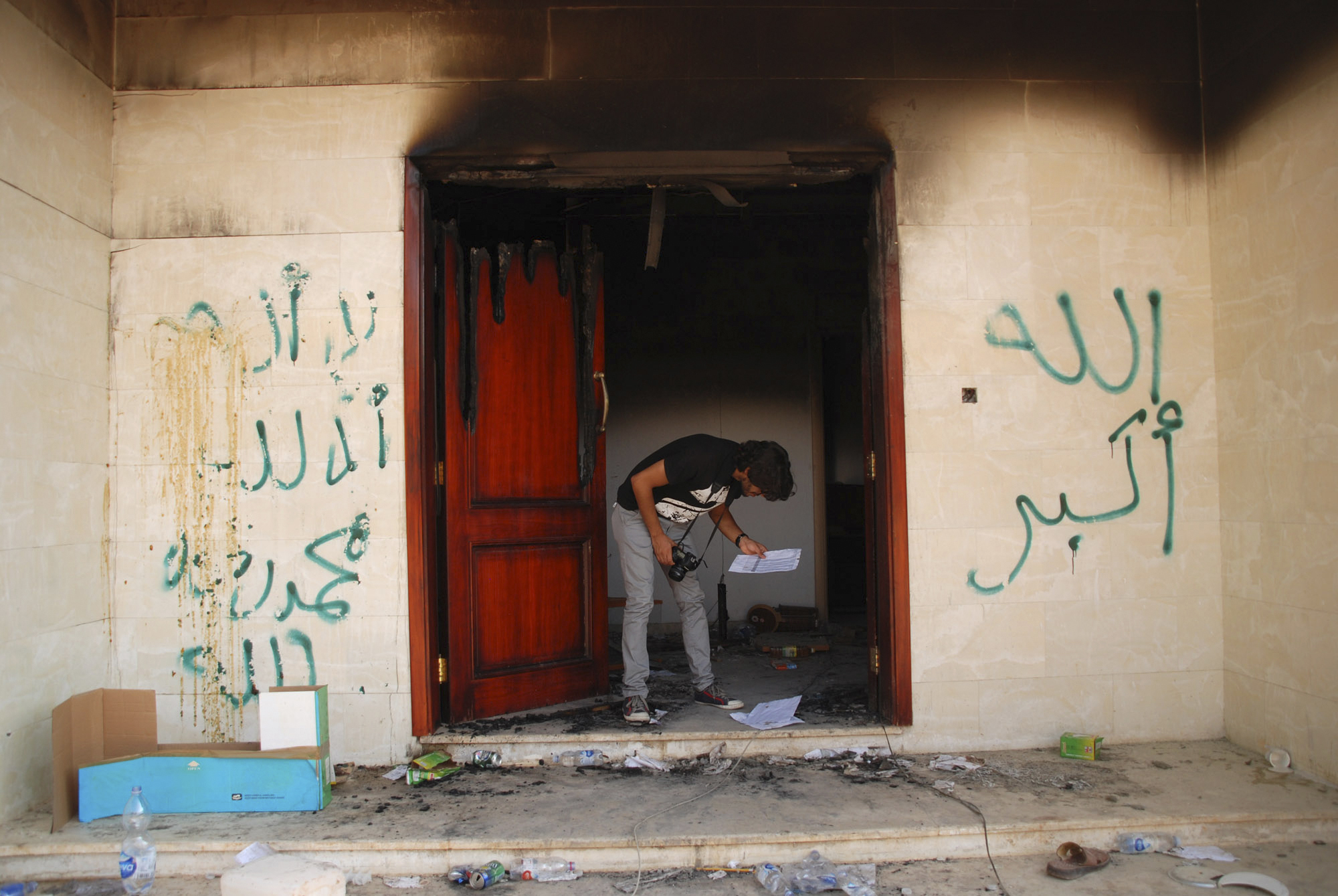 The Latest: Bodyguard recounts deadly Benghazi attack