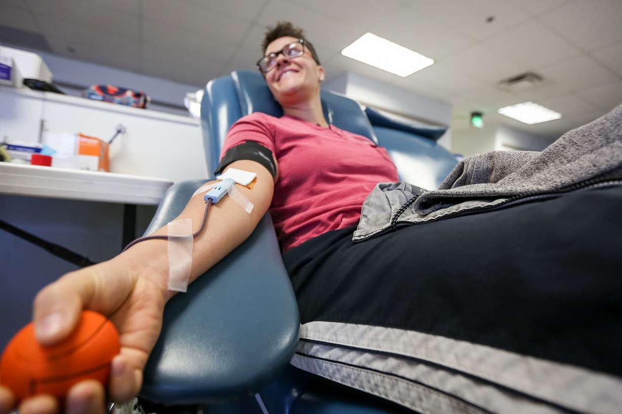 Shay Kennedy donates blood at the American Red Cross Donation Center in Salt Lake City on Monday, Oct. 2, 2017. Kennedy, who went to school in Las Vegas, was moved to donate Monday because of the mass shooting there. (Photo: Adam Fondren, KSL)