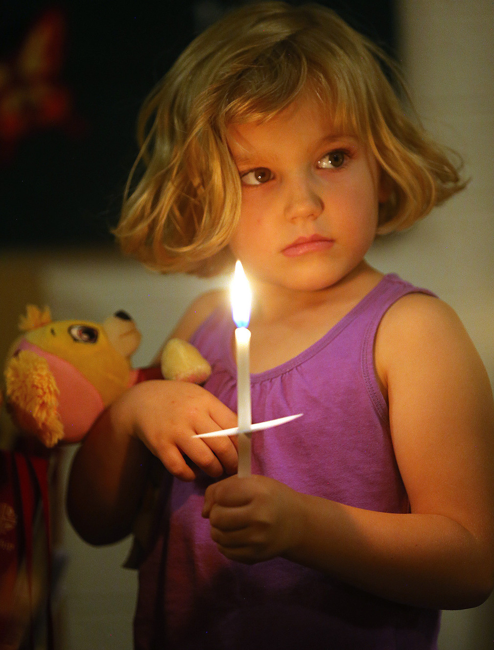 Phoebe Verkaik attends a prayer and candlelight service at the Reformation Lutheran Church in Las Vegas with her family following the mass shooting Monday, Oct. 2, 2017. (Photo: Scott G Winterton, Deseret News)