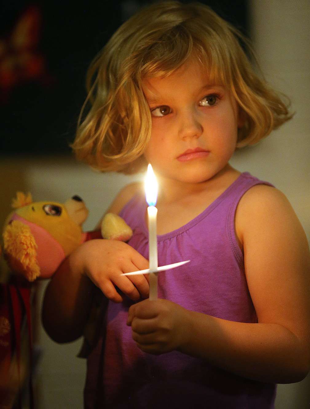 Phoebe Verkaik attends a prayer and candlelight service at the Reformation Lutheran Church in Las Vegas with her family following the mass shooting Monday, Oct. 2, 2017. (Photo: Scott G Winterton, Deseret News)