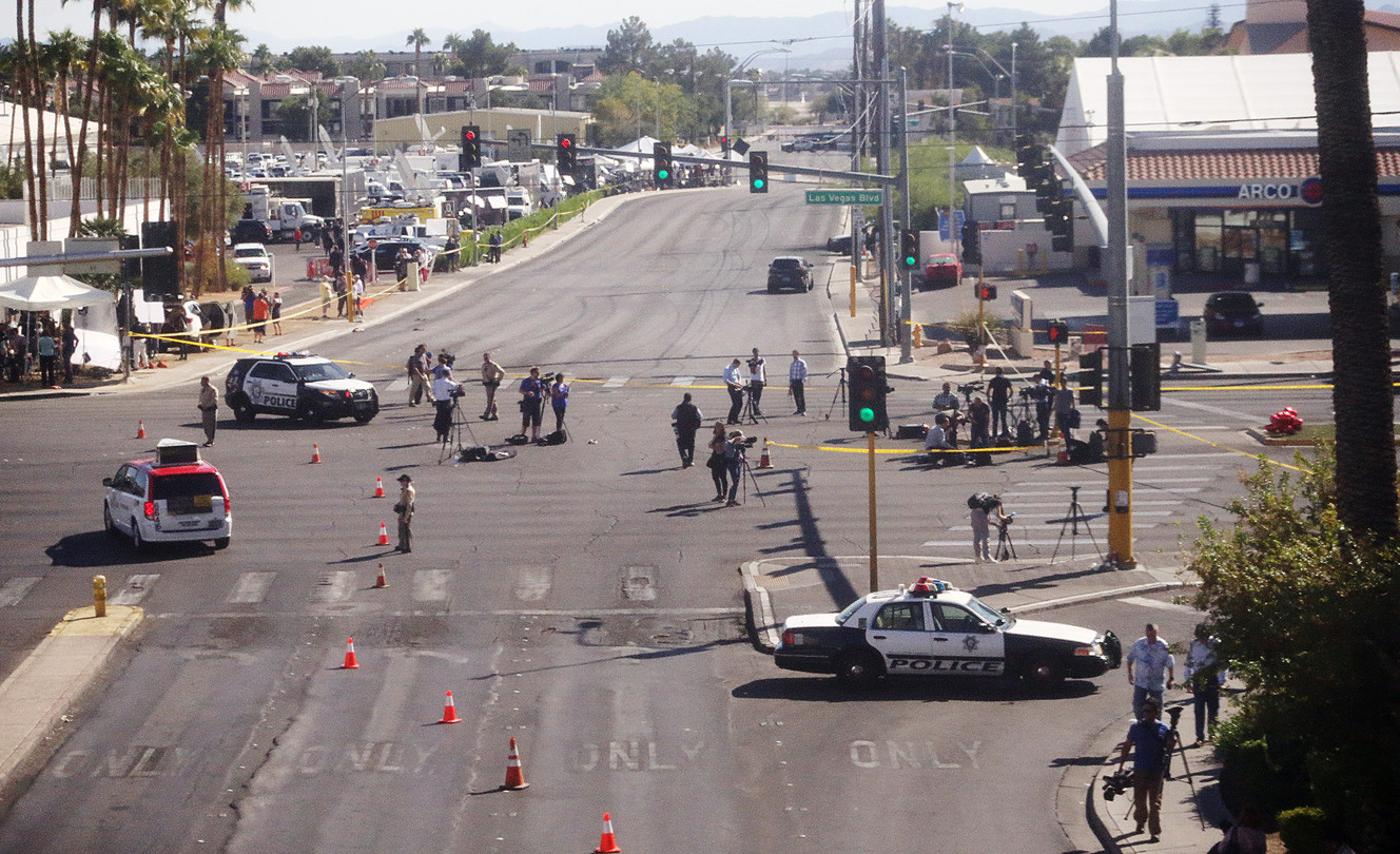 Media continue reporting on the Las Vegas mass shooting at the Route 91 Harvest Festival on Tuesday, Oct. 3, 2017. (Photo: Scott G Winterton, Deseret News)