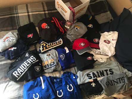 Various shirts and gear former Brock Miller has received from NFL teams after working out with the team. (Photo: Photo Courtesy Brock Miller)