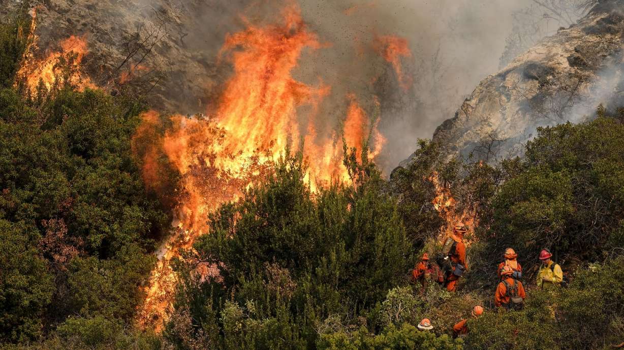 Winds, floods and fire: US ties record for costly weather