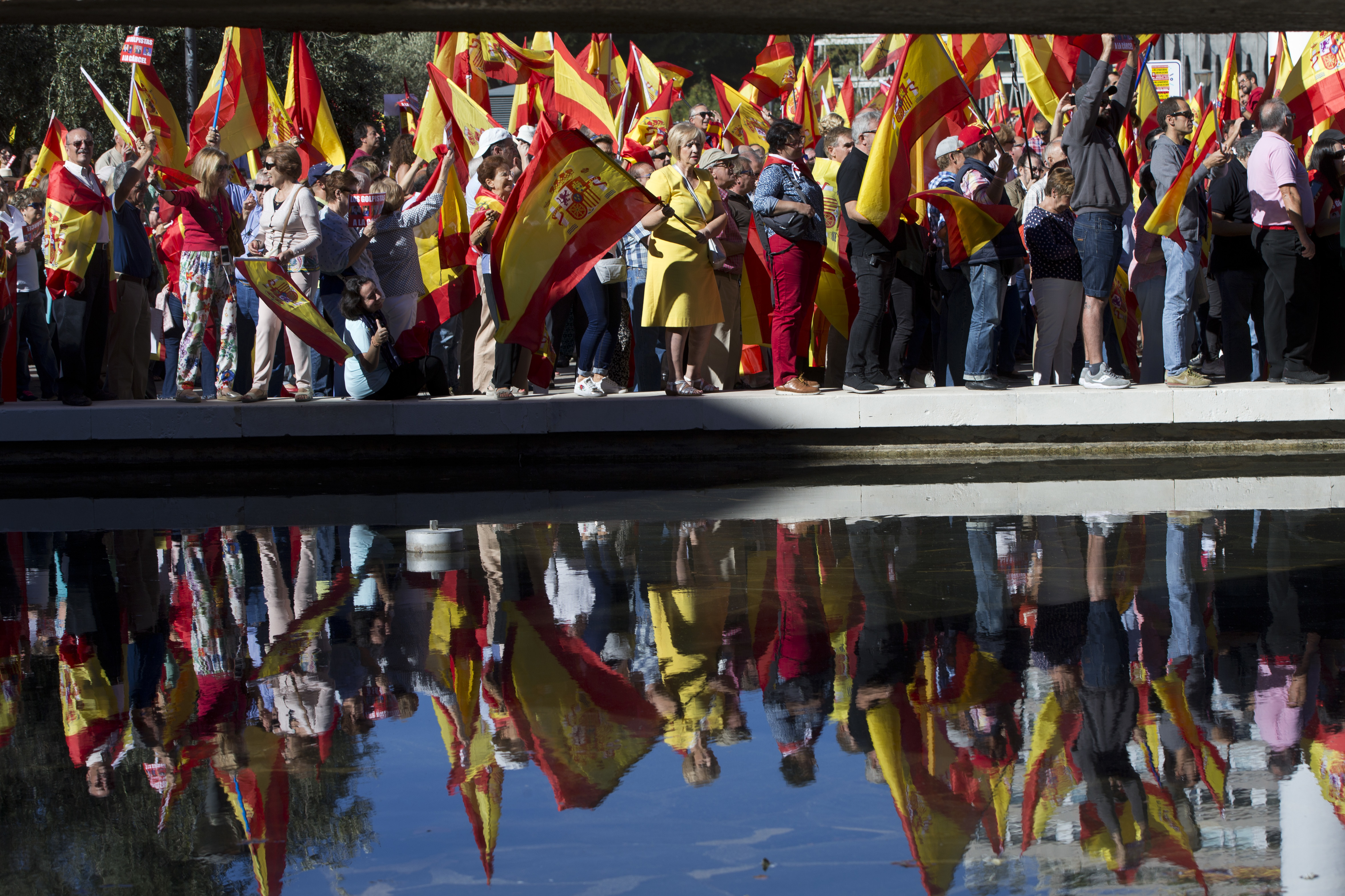 The Latest: Spain minister warns of Catalan business exodus