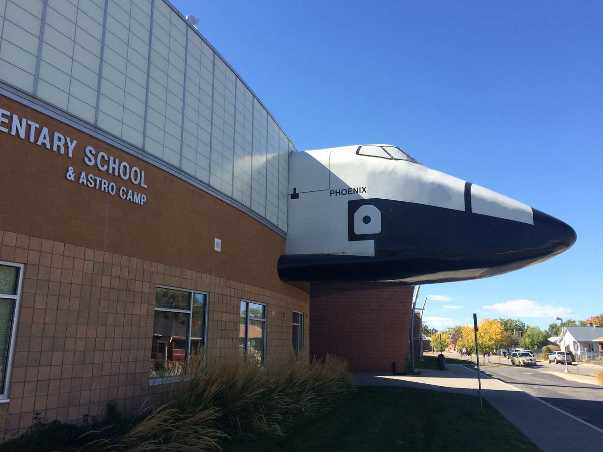 The Space Shuttle cockpit juts out the side of the Astro Camp Space and Science Center in Ogden. The mockup is used for space missions for students and camp participants and will be open to the public Monday night.