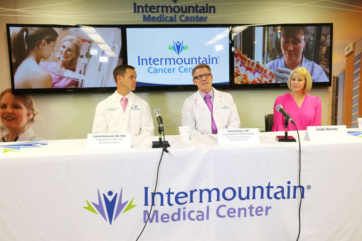 Dr. Lincoln Nadauld, executive director of Intermountain Precision Genomics, left, Dr. Brett Parkinson, a radiologist with the Breast Care Center at Intermountain Medical Center, and Linda Warner, a breast cancer survivor, discuss the launch of a cutting-edge genomics breast cancer study for Utah women during a press conference in Murray on Monday, Oct. 9, 2017. The study seeks to determine whether specific blood tests that look for DNA from cancer tumors can be used to complement screening mammography to improve the way breast cancer is diagnosed. (Photo: Scott G Winterton, KSL)