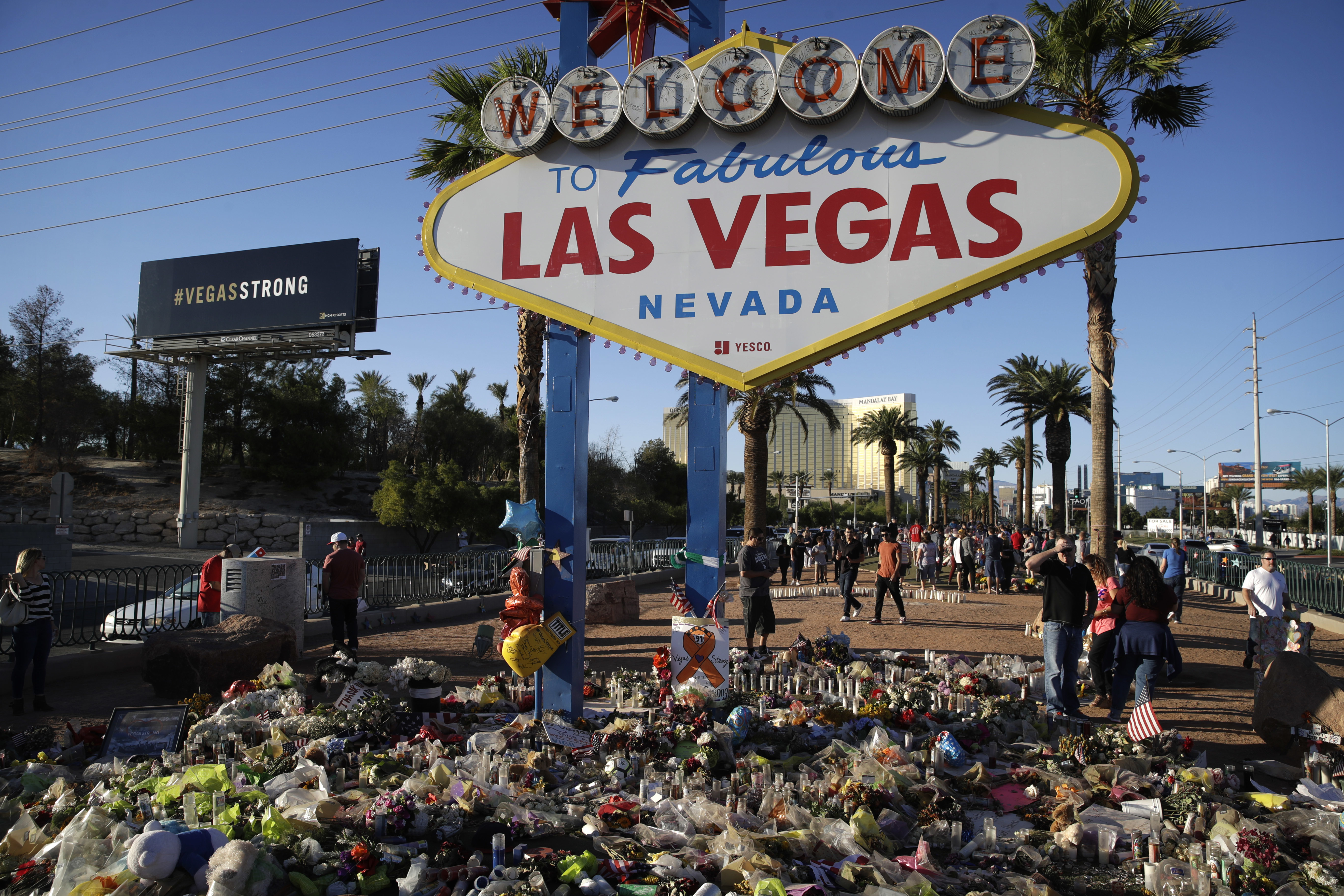 The Latest: Vegas hockey team honors victims of shooting