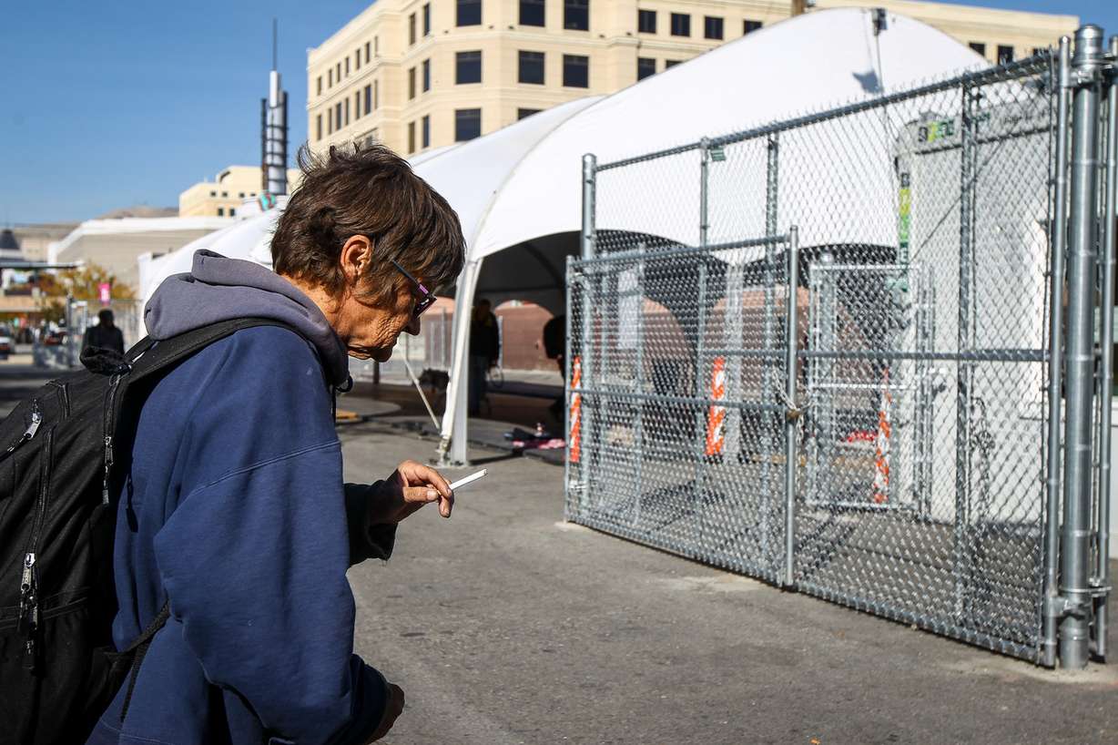 A client of the Road Home walks past the Safe Space Welcome Center on Rio Grande Street in Salt Lake on Monday, Oct. 16, 2017. The area will soon be open to only those who have a DWS-issued ID card. (Photo: Adam Fondren, KSL)