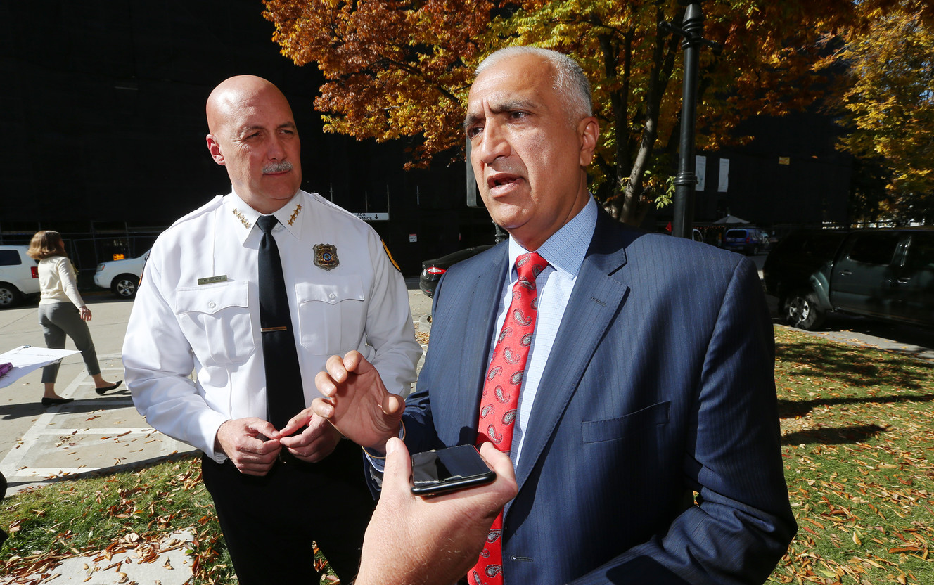 Salt Lake City Police Chief Mike Brown watches and Salt Lake County District Attorney Sim Gill discusses Salt Lake City Mayor Jackie Biskupski's executive order governing the release of body camera footage from the Salt Lake City Police Department during a press conference at the Salt Lake City-County Building on Tuesday, Oct. 17, 2017. (Photo: Scott G Winterton, KSL)