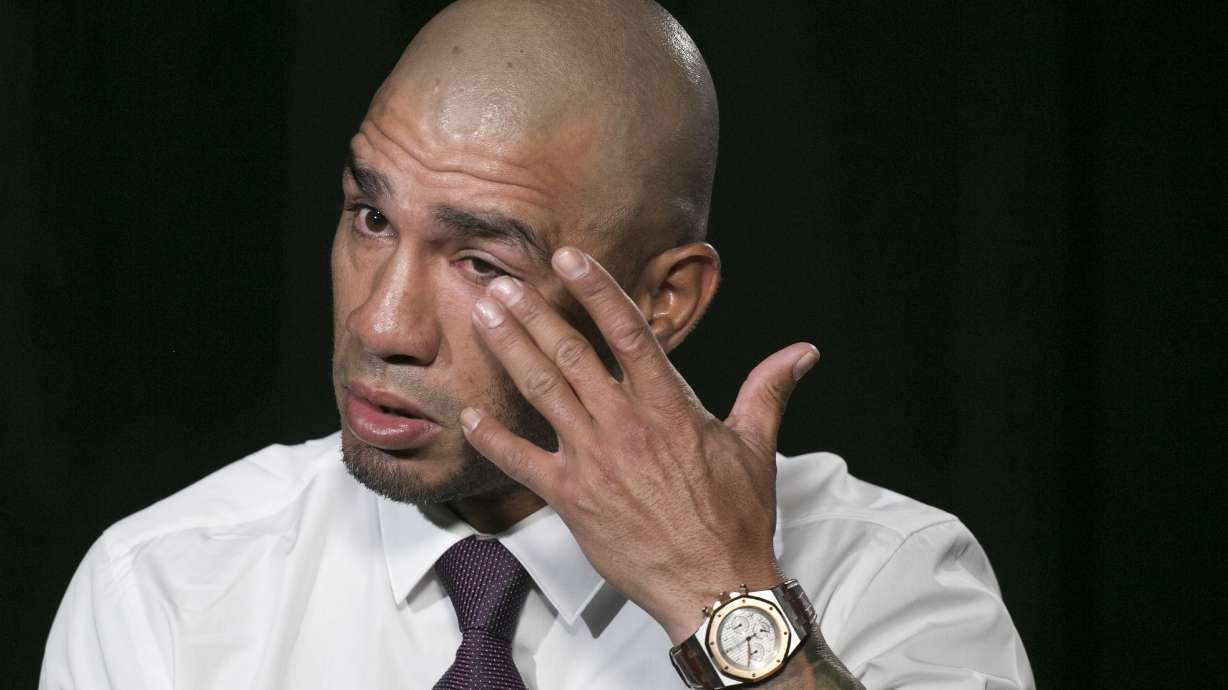 AP Interview: Cotto bids farewell to ring, embraces family