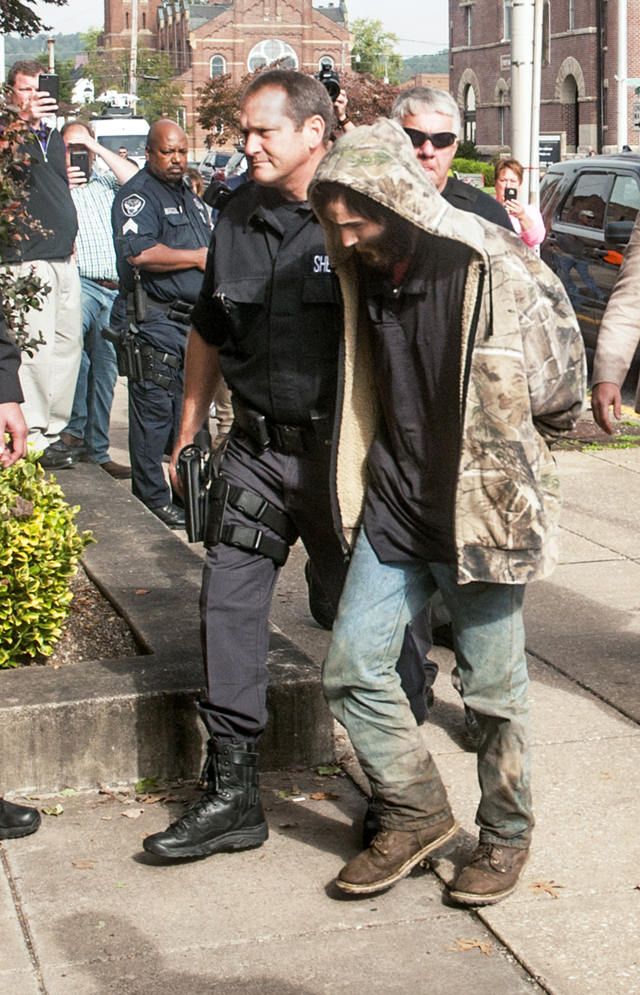 Suspect in fatal shootings of 4, including boy, is indicted