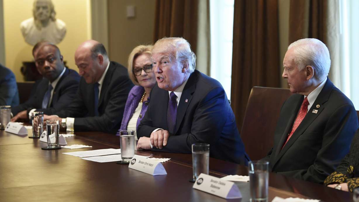 The Latest: Trump warns Democrats about opposing tax plan