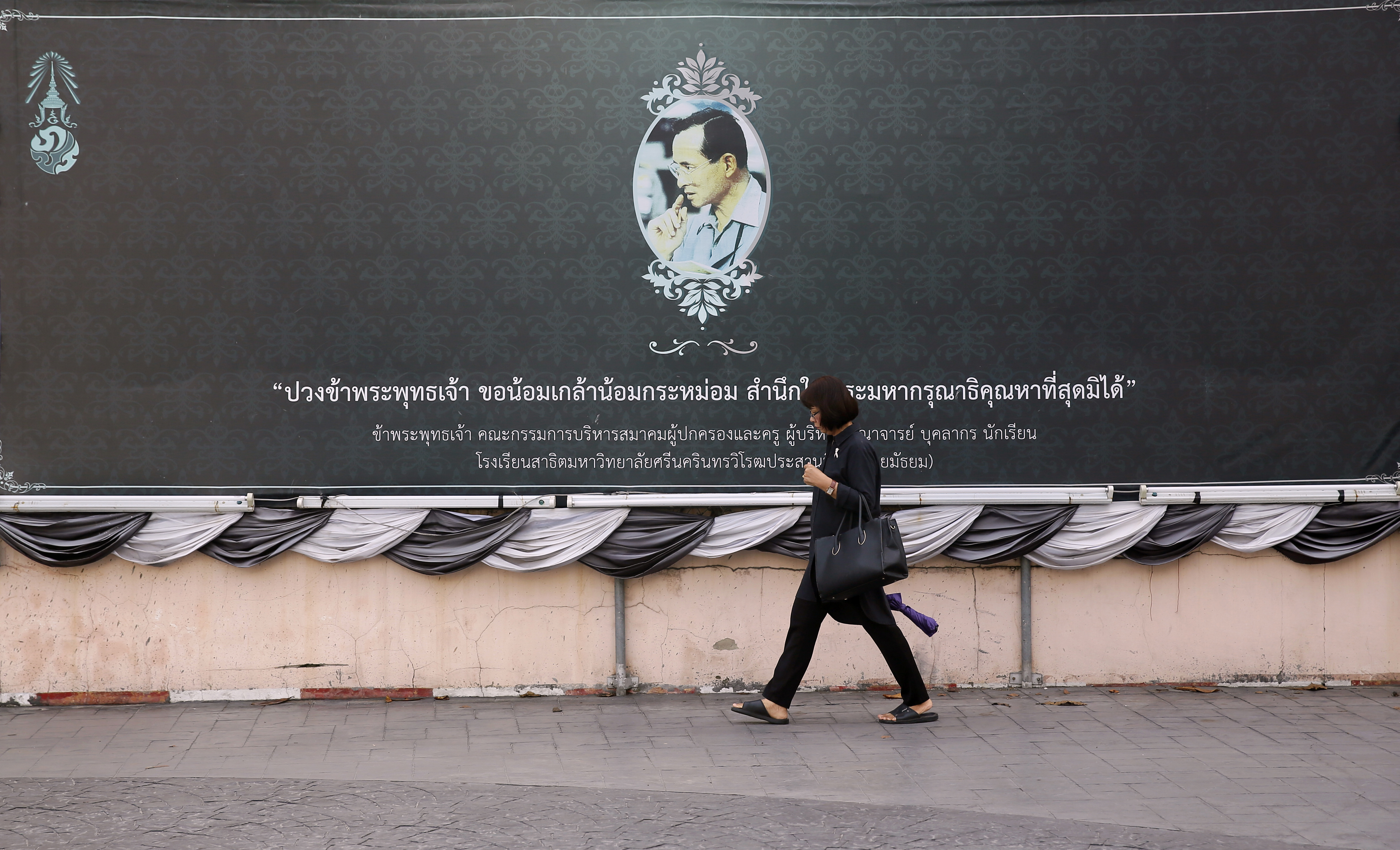 Bangkok returns to mourning colors, but what of the future?