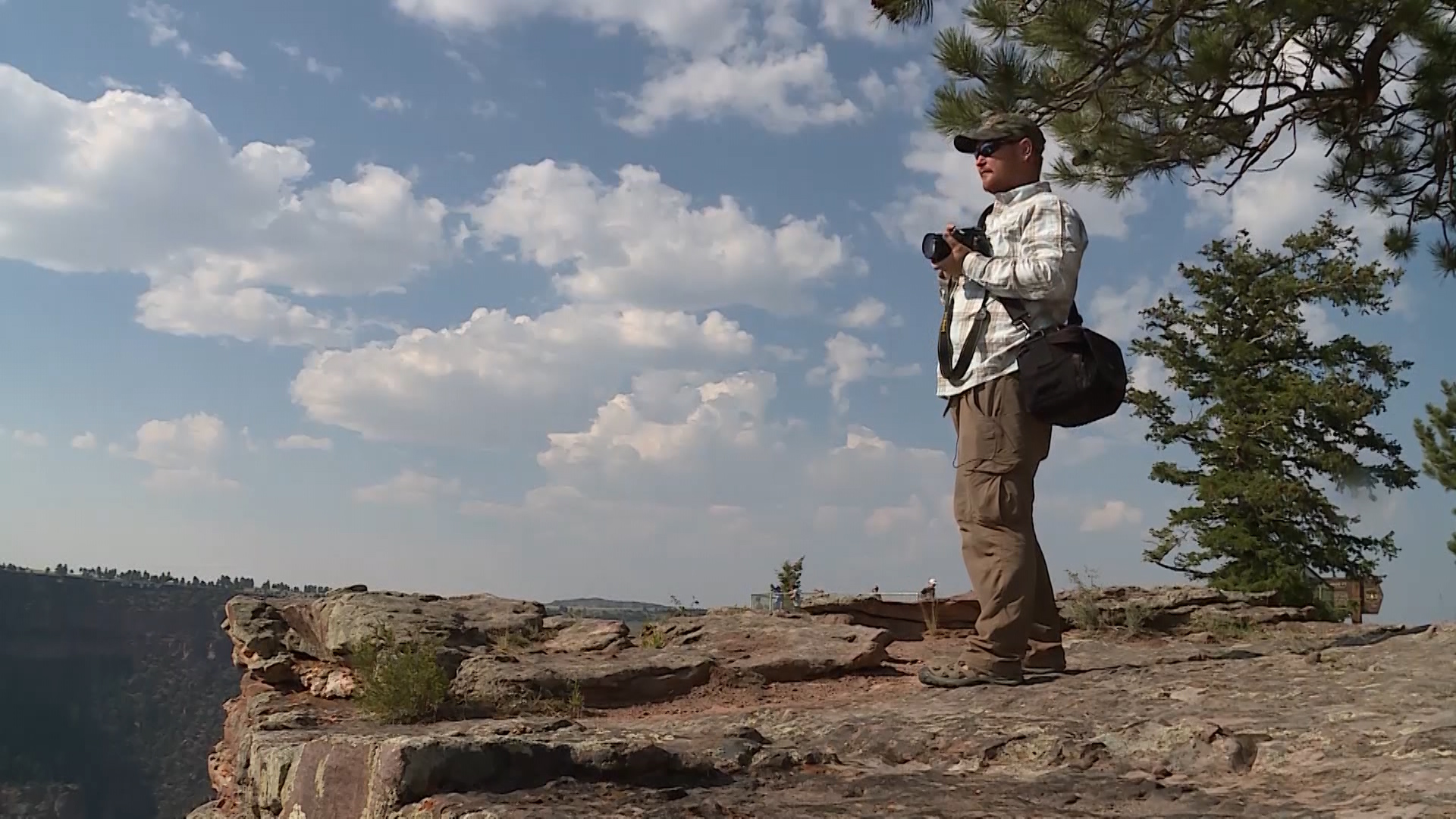 Ryan Kelly, a photographer and fishing guide, lives in Flaming Gorge. He wears several hats to try to make a living in the area. (Photo: KSL TV)
