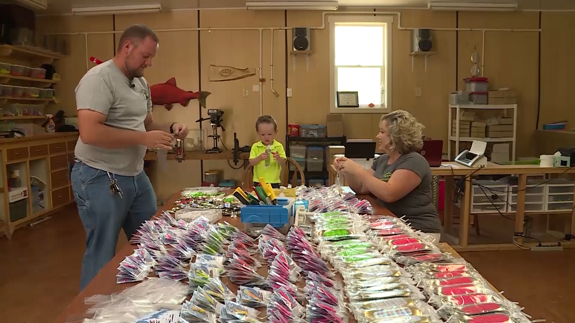 Colton and Calisha Christenson run a fishing tackle company named Lake Shore Tackle Company out of a small shop next to their home, which means they can raise their children together at home. (Photo: KSL TV)