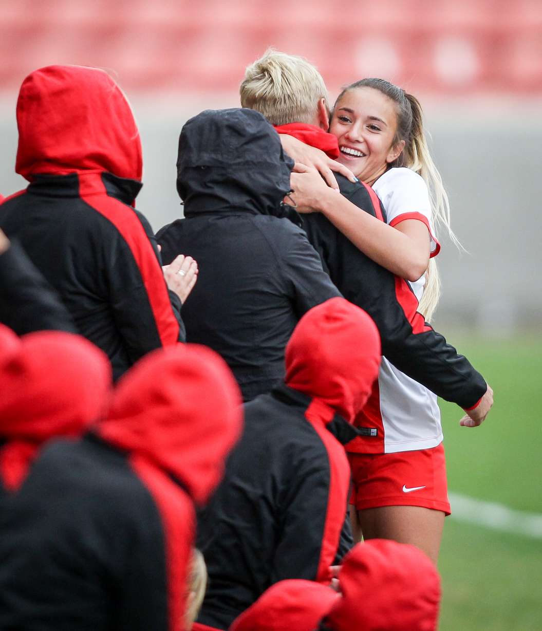 American Fork's Addison Holmstead (5) hugs head coach Derek Dunn after being taken out following scoring the third and final goal of the match as Syracuse High School takes at Rio Tinto Stadium in Sandy on Friday, Oct. 20, 2017. (Photo: Adam Fondren, Deseret News)