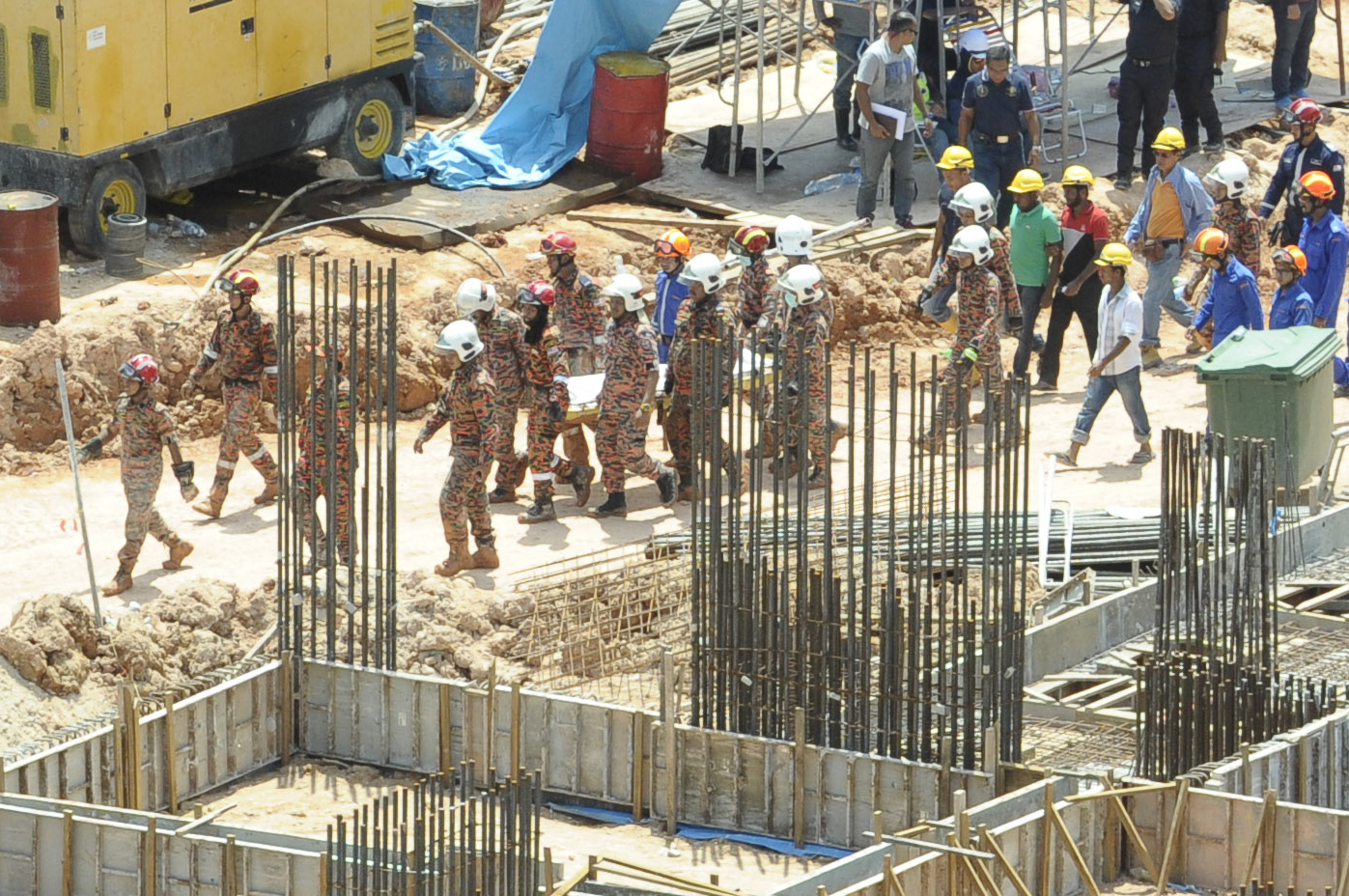 Toll rises in Malaysian landslide; 11 dead mostly foreigners