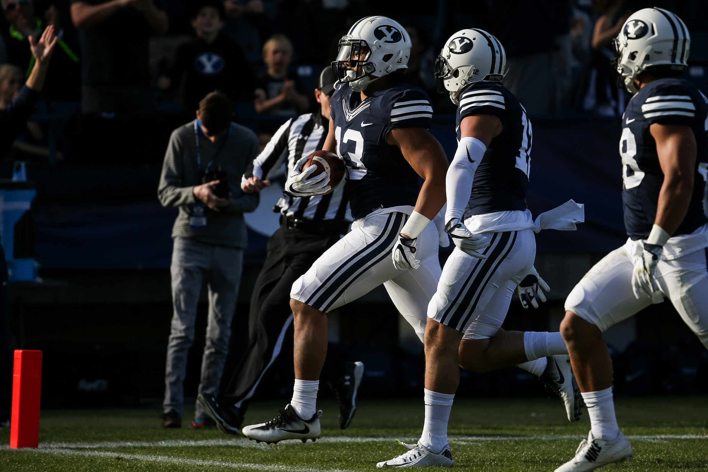 BYU linebacker Francis Bernard (13) scores a touchdown against the UMass Minutemen at LaVell Edwards Stadium in Provo on Saturday, Nov. 19, 2016. (Photo: Spenser Heaps, Deseret News)