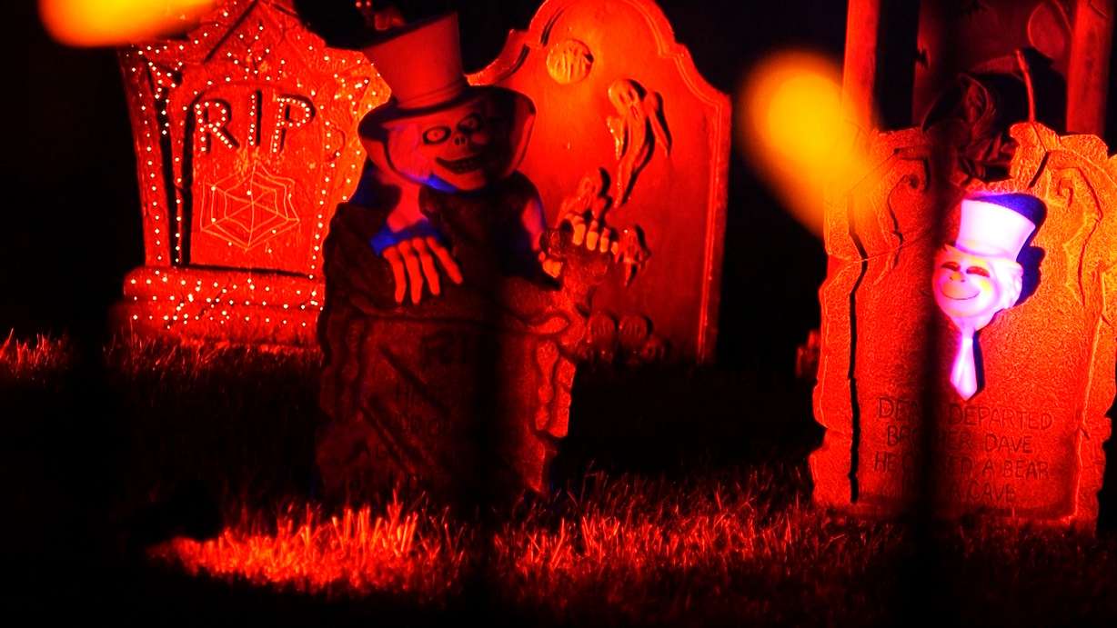 Over the years, a few outdoor decorations in Greg Shoop's yard has turned into now a front-yard graveyard, a small army of skeletons, a skeleton horse and rider, a pumpkin man, a three-headed dog, a ghost and eyeball lights — all synced to a musical soundtrack.