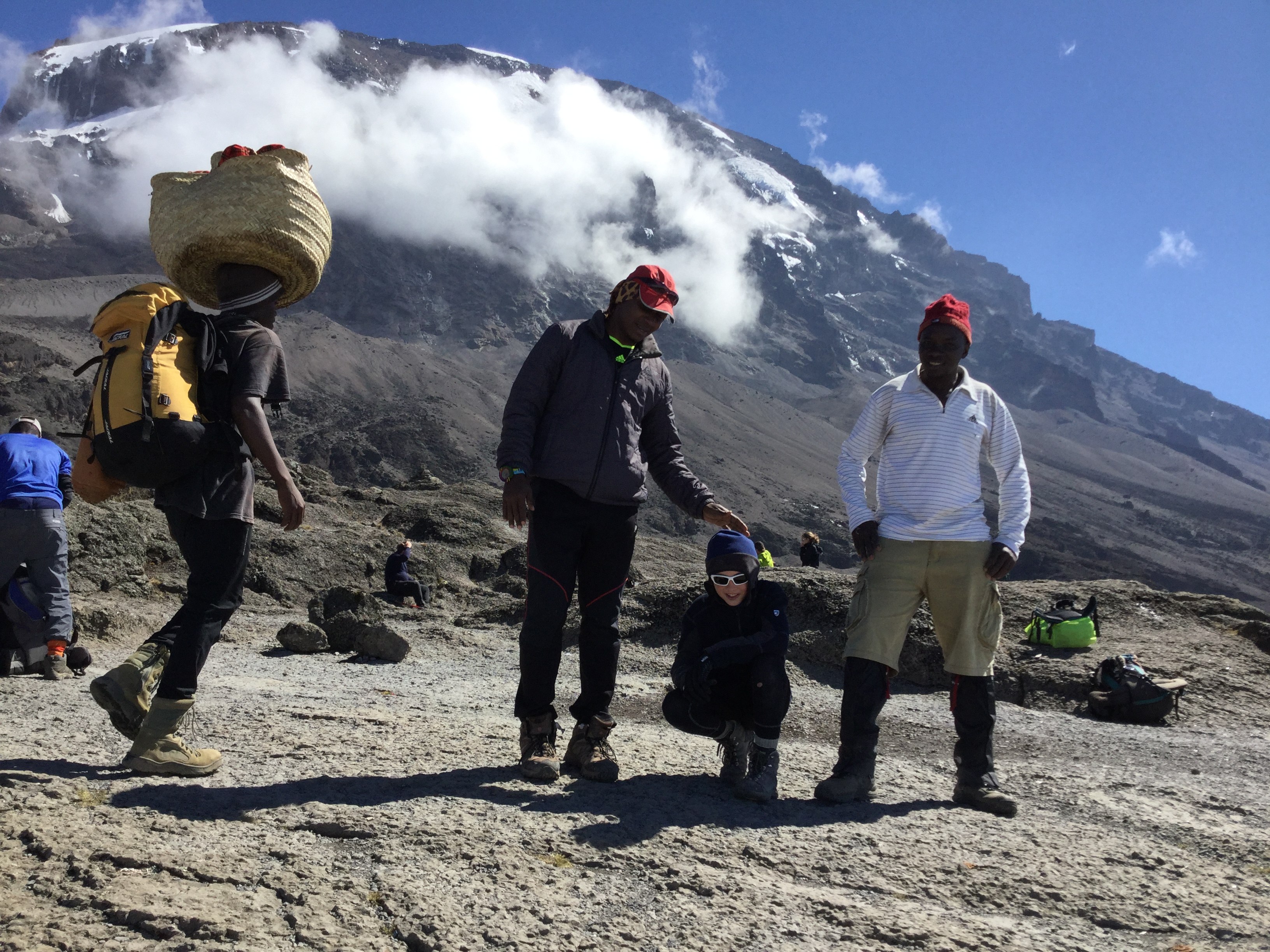 Jace Chapman with mountain guides (Photo courtesy Caci Chapman)