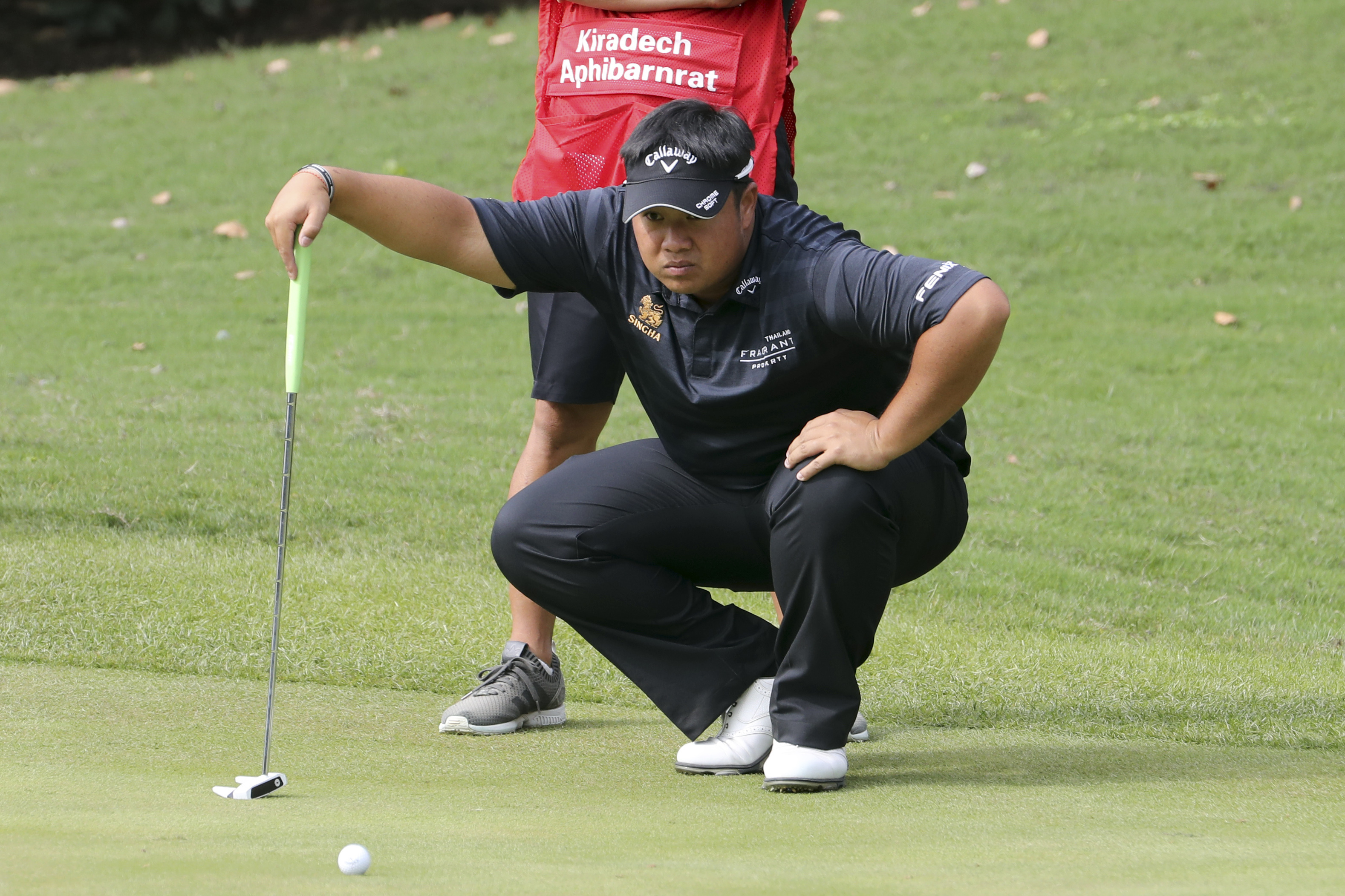 Thai golfer motivated by funeral for king and starts strong