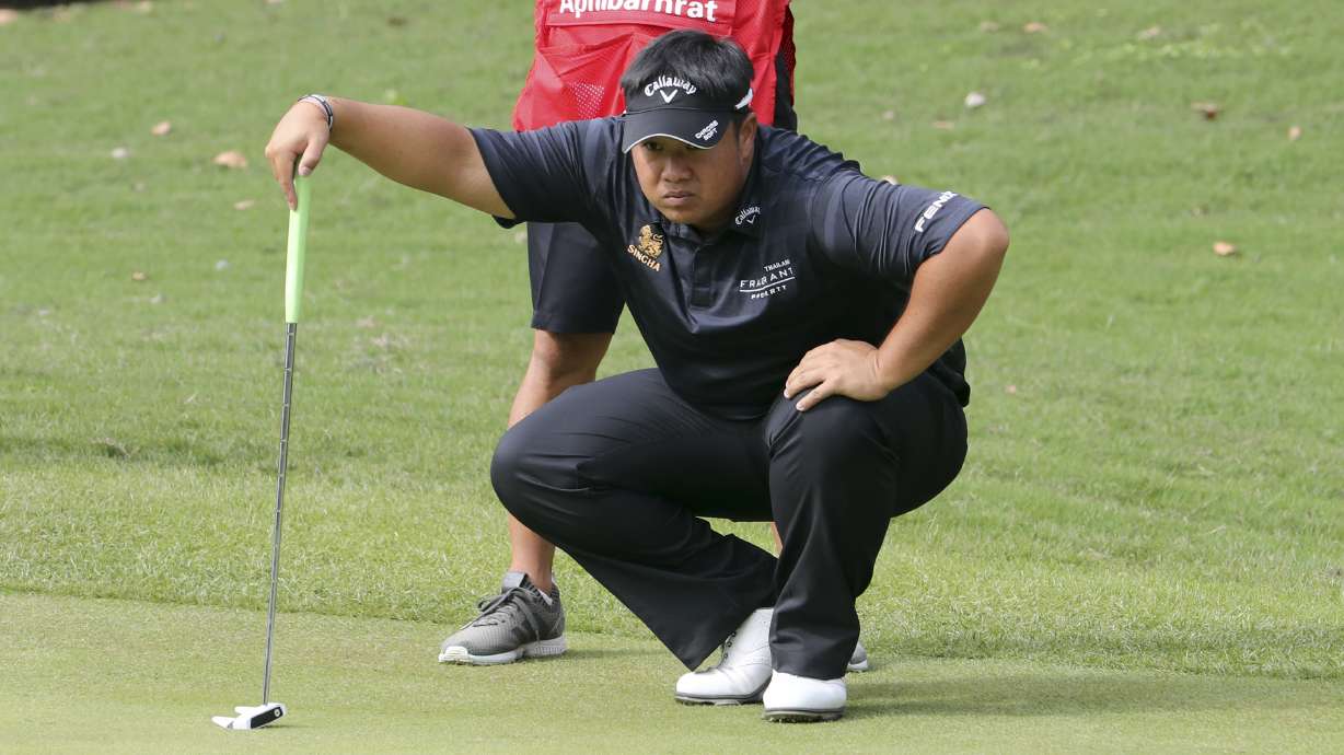 Thai golfer motivated by funeral for king and starts strong