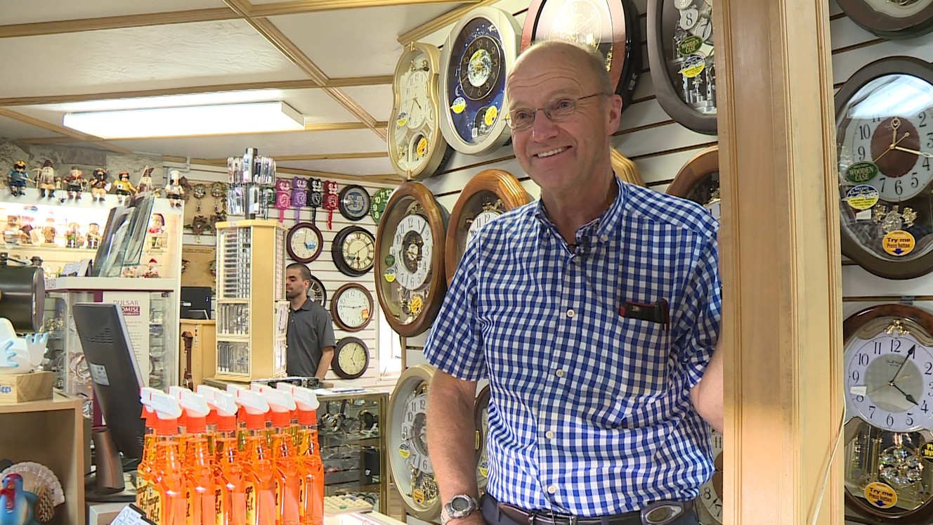 Norm Recksick leans on a pillar at Mt. Olympus Clock Shop in Holladay. (Photo: Ray Boone, KSL)