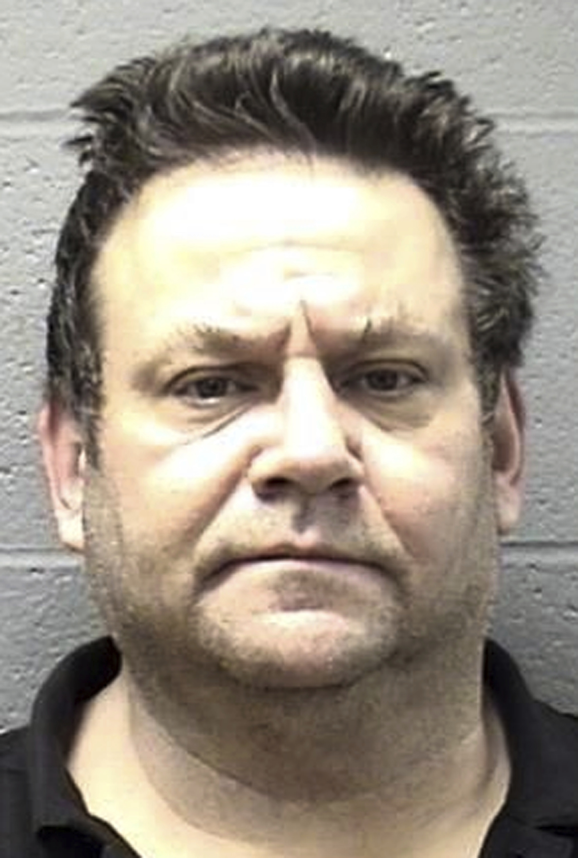 Man charged after mother's remains found in Chicago lagoon