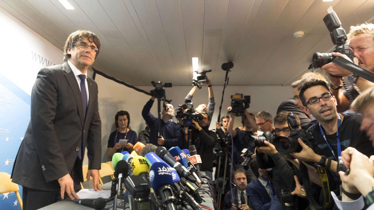 The Latest: Lawyer: Puigdemont should be quizzed in Belgium