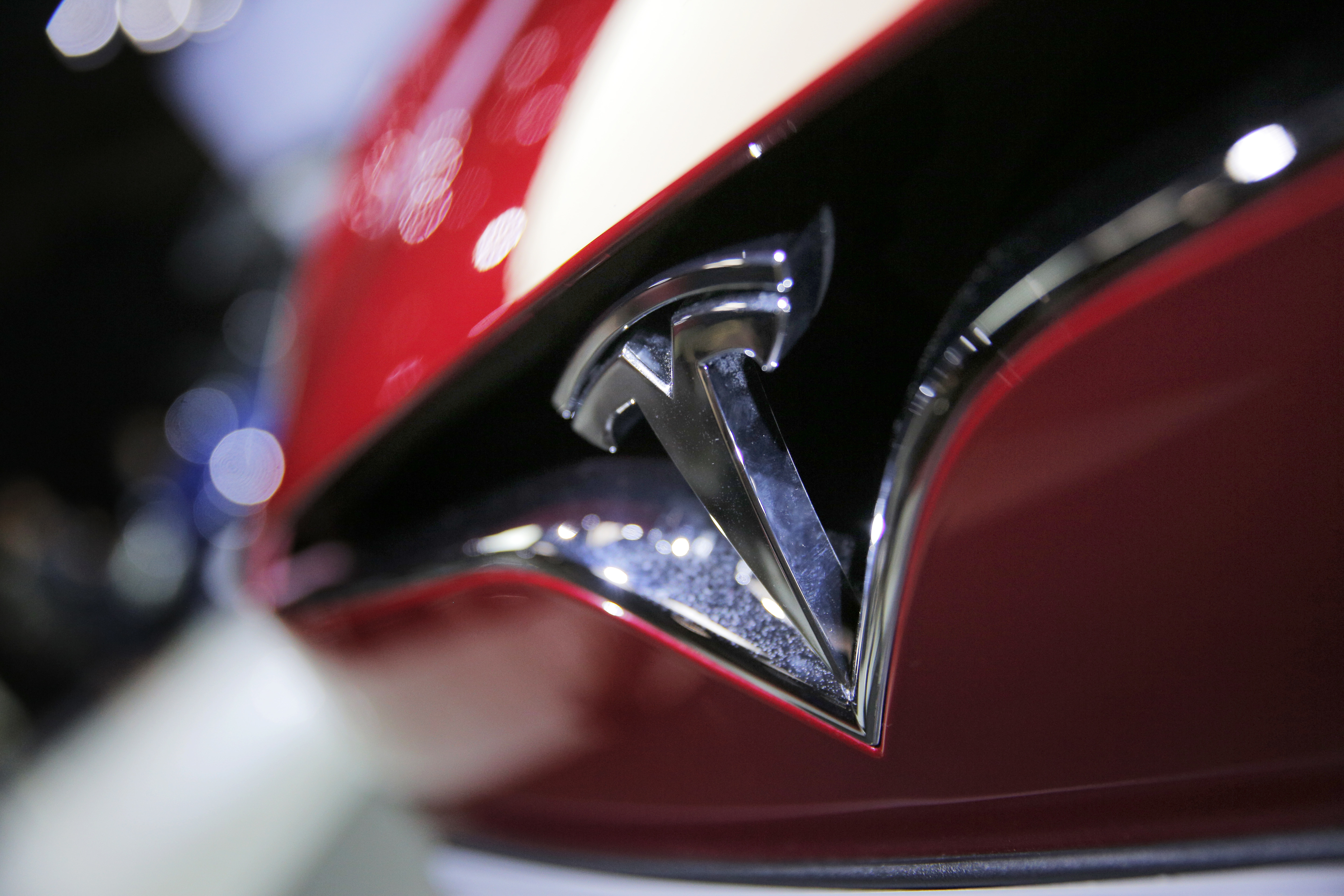 Tesla posts record quarterly loss of $619M on Model 3 delays
