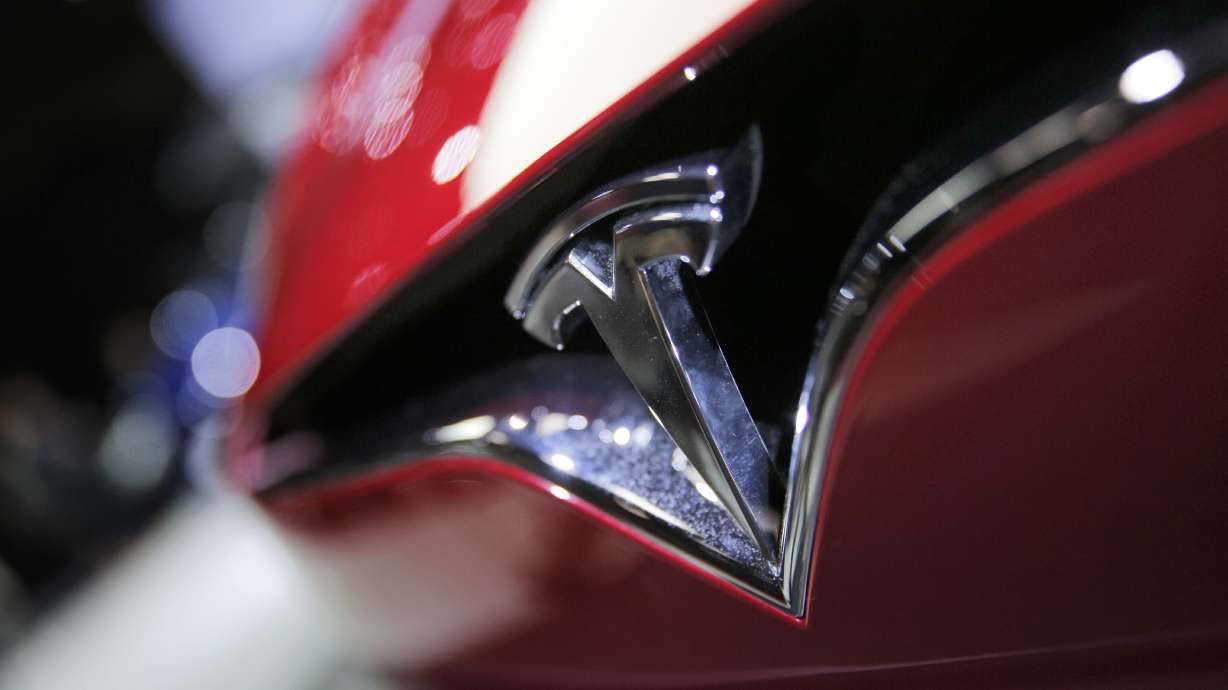 Tesla posts record quarterly loss of $619M on Model 3 delays