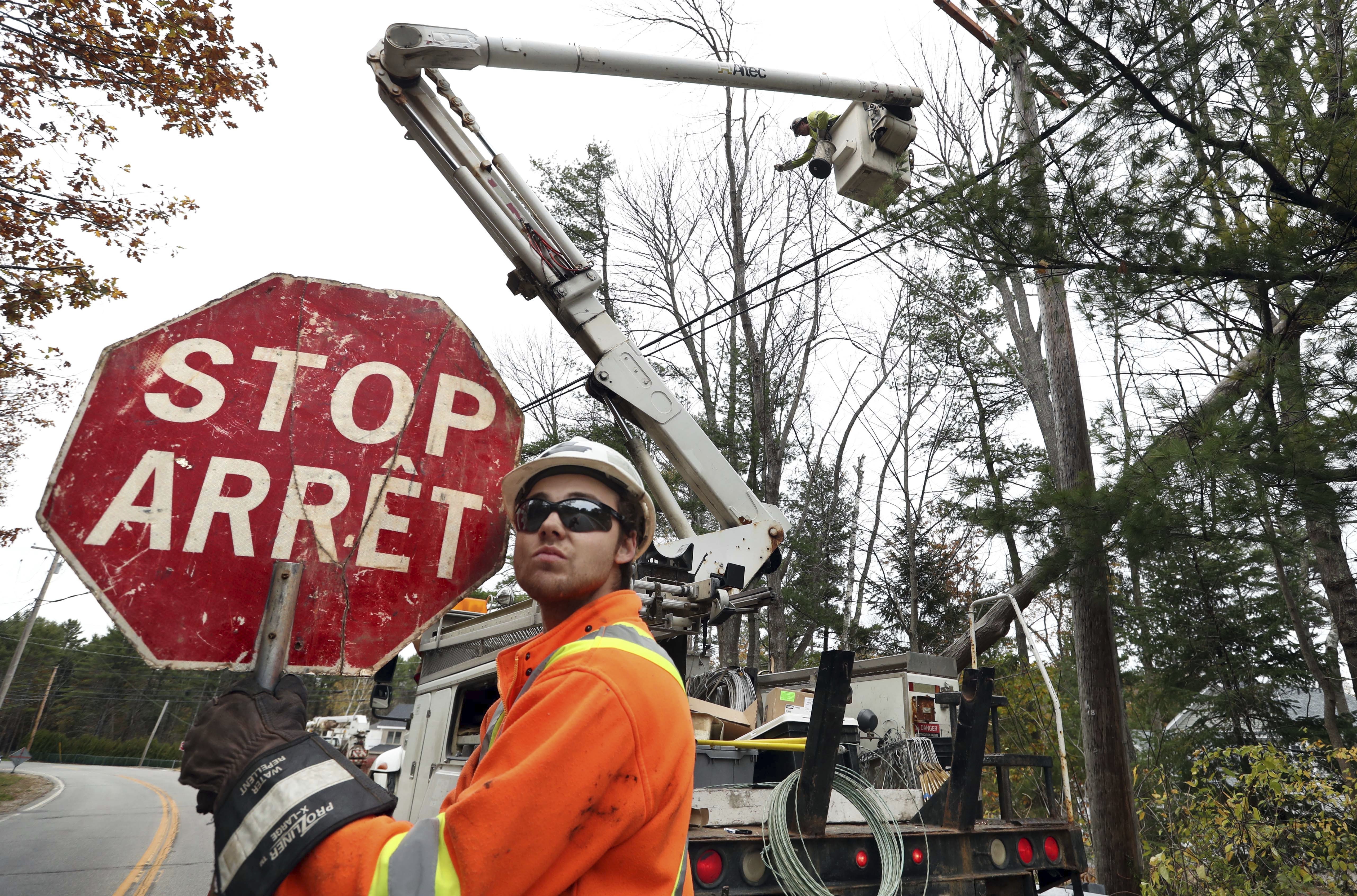 Hundreds of utility crews working in Maine on power outages