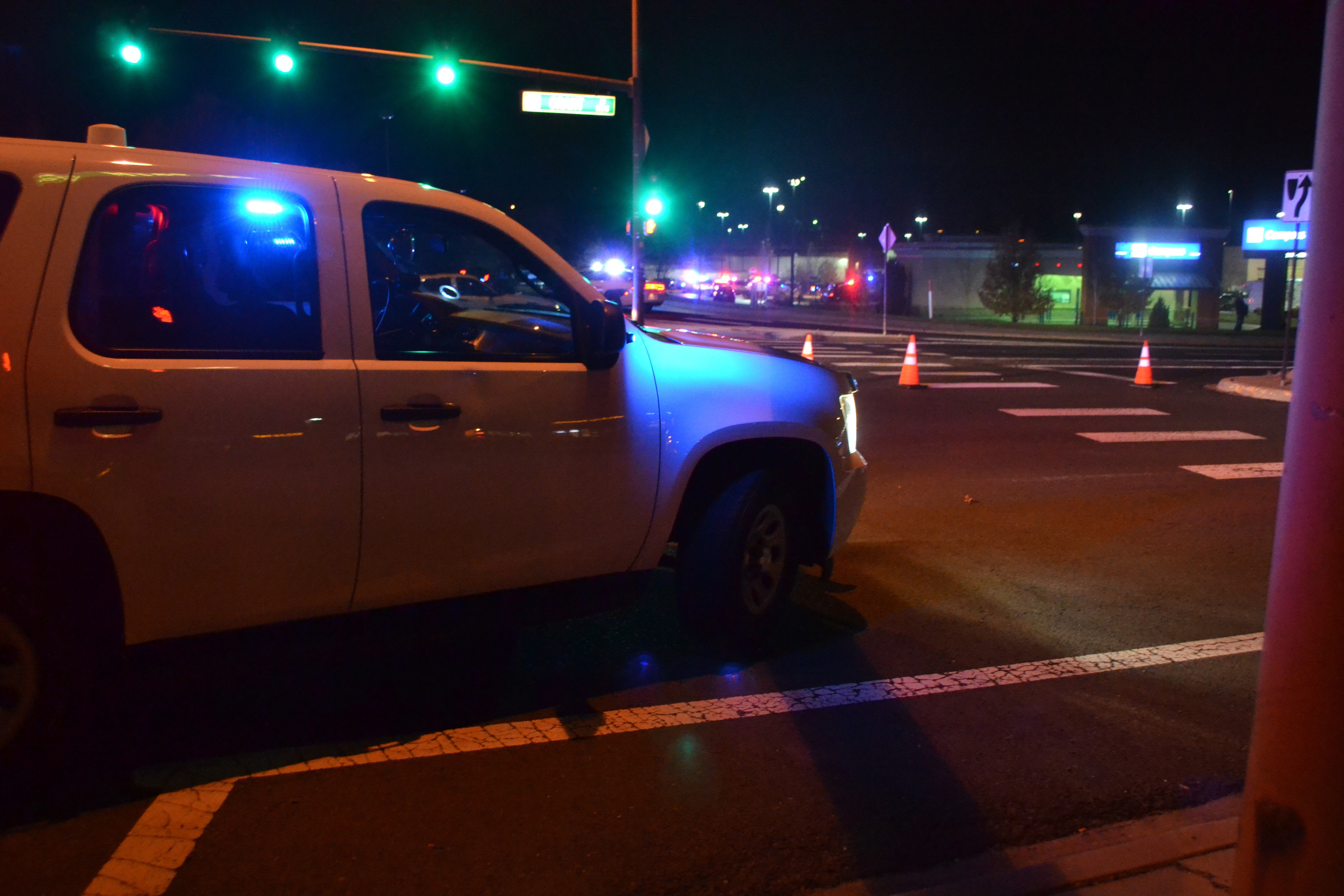 The Latest: Police say shoppers drew guns after shooting