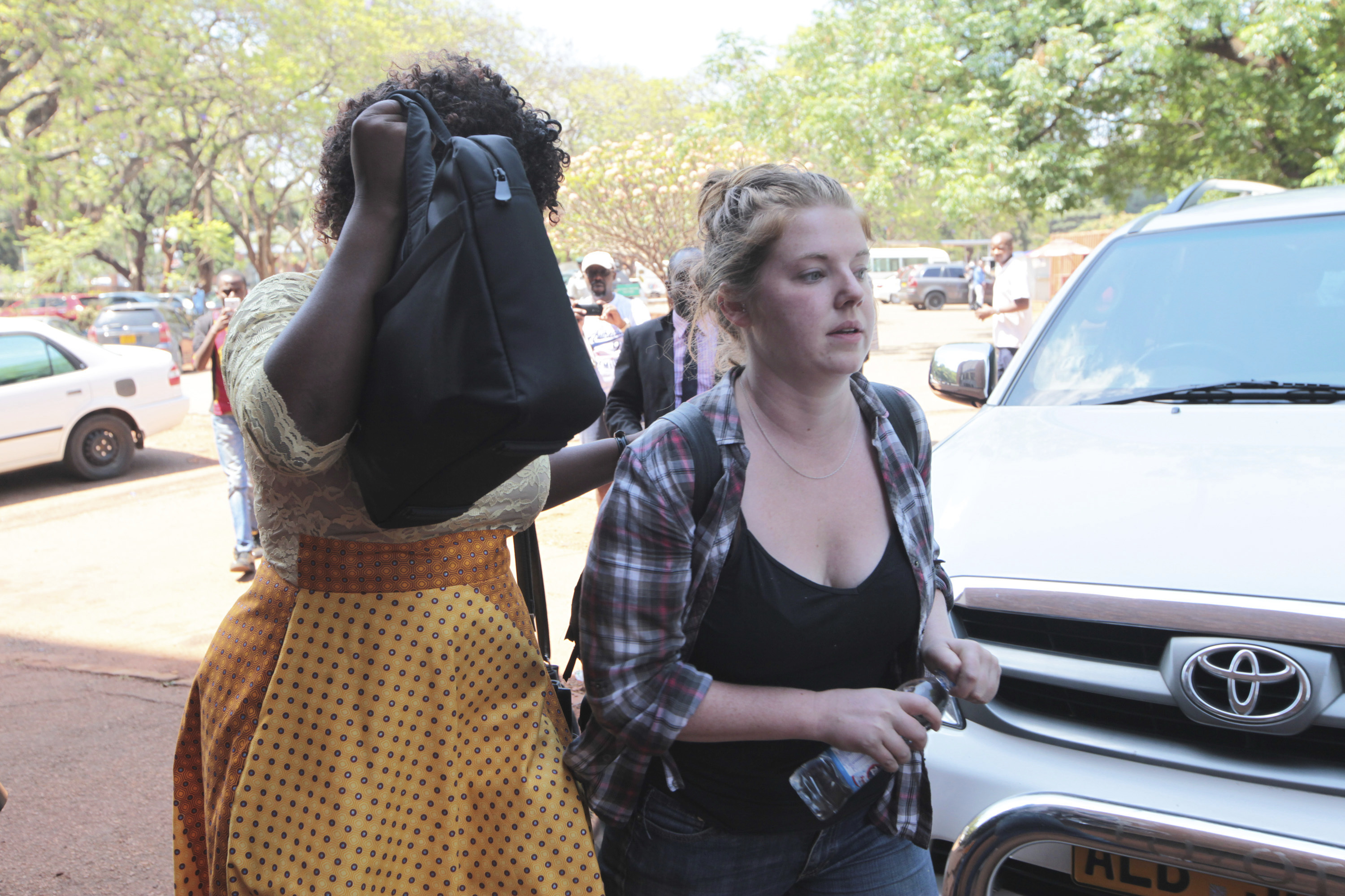The Latest: American accused in Zimbabwe to stay in jail